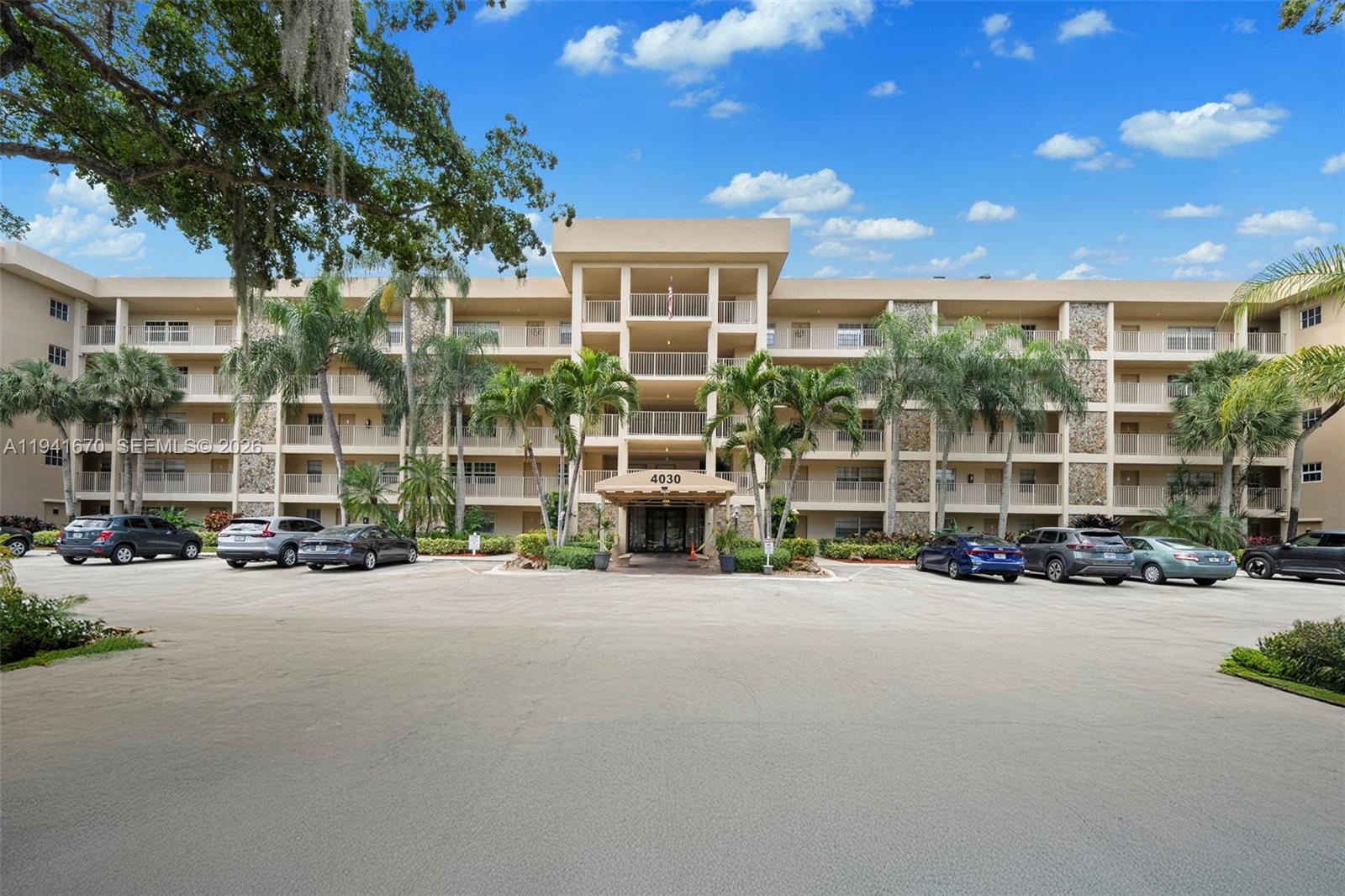 Beautiful 3 BR and 2 BA condo fully furnished. Ready to move, is located in the most desirable community of Palm Aire Country Club. This gorgeous and spacious, bright corner unit offers a spectacular panoramic direct lake & golf course view. It has an oversized balcony, hurricane impact windows and doors. European porcelain tile throughout, open kitchen with recessed lighting, stainless steel appliances and beautiful granite counter tops. Has a laundry closet with washer & dryer, custom design bathrooms & a walk in closet in the master bedroom. This unit includes one parking space and extra storage. Nice recreational park right across the street featuring tennis courts, volleyball, basketball and more. A must see, don't lose this great opportunity.The owners are foreigner.