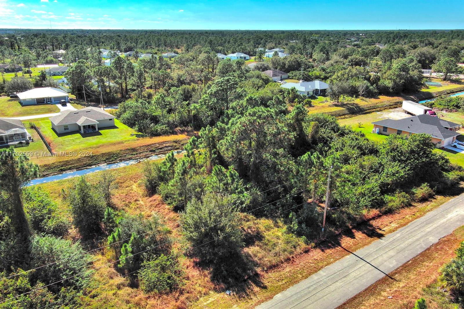 Exclusively offered by Sunland Real Estate: premium 0.25-acre residential lot in the heart of Central Lehigh Acres, perfectly positioned for your next development. This prime property boasts a high and dry elevation, ensuring it's completely outside flood zones and ideal for building with confidence. Conveniently located near major boulevards, this lot provides direct access to the town center, making it a fantastic choice for those seeking convenience and growth potential. Lehigh Acres is a thriving Southwest Florida community celebrated for its affordable land, welcoming neighborhoods, and excellent location near Fort Myers. Enjoy quick access to shopping, dining, and the breathtaking Gulf Coast beaches. Don’t miss this opportunity to invest in one of the region’s most promising areas.