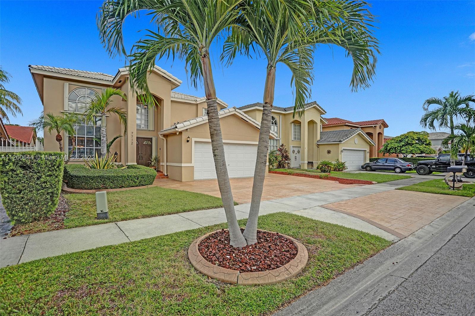 Welcome home! Spectacular 4 bedrooms, 3 baths 2-story single family home in the sought after neighborhood of Lago Mar in Kendall. The house features beautiful vaulted ceilings, round top picture window and an elegant entryway leading to the staircase with 1 bed/1 bath downstairs and 3 bed/2 bath upstairs.  The kitchen overlooks the patio; great for your morning coffee or afternoon cocktail, entertaining at its best! The stamped concrete in the patio makes maintenance a breeze! Excellent neighborhood with "A" schools, plenty of shopping centers, restaurants, supermarkets, hospitals and highways less than a mile away. Bring highest and best offers as this beauty will go fast! Proof of funds and/or DU approvals required for all offers.  Showings mornings 9:30AM-12PM by appointment only.