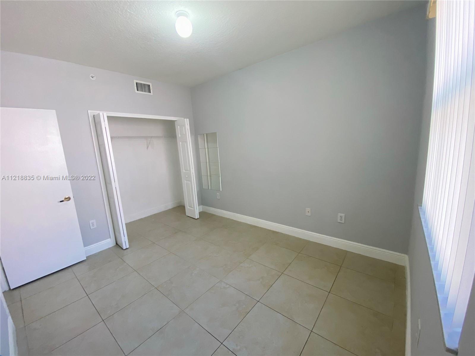 THE COURTS AT DORAL ISLES - Residential Lease