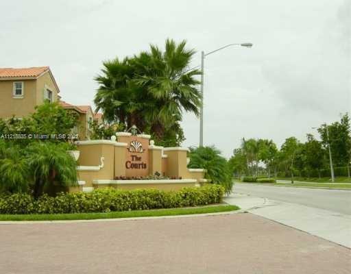 THE COURTS AT DORAL ISLES - Residential Lease