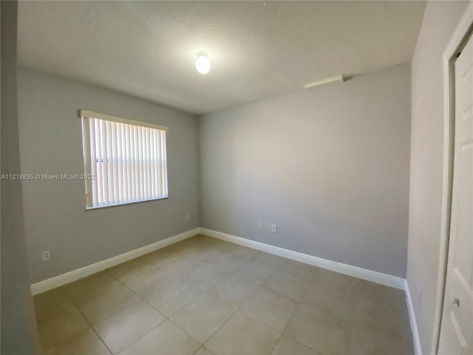 THE COURTS AT DORAL ISLES - Residential Lease