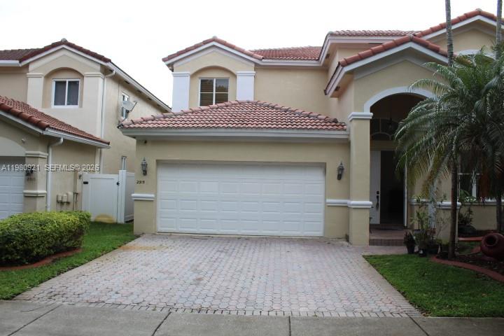 Rare find in Monarch Lakes! Bright & airy 4BR/3BA home featuring dramatic double-height ceilings and a sought-after 1st-floor bedroom + full bath. Includes a spacious kitchen with wood cabinets and stainless steel appliances. Situated on a beautiful lot of over 3474 sq. ft. with a large patio perfect for entertaining. Low HOA, top-rated Miramar schools, and minutes from shopping and major highways. Perfect for families and entertainers alike! Seller is highly moyivated! Do not miss this opportunity!