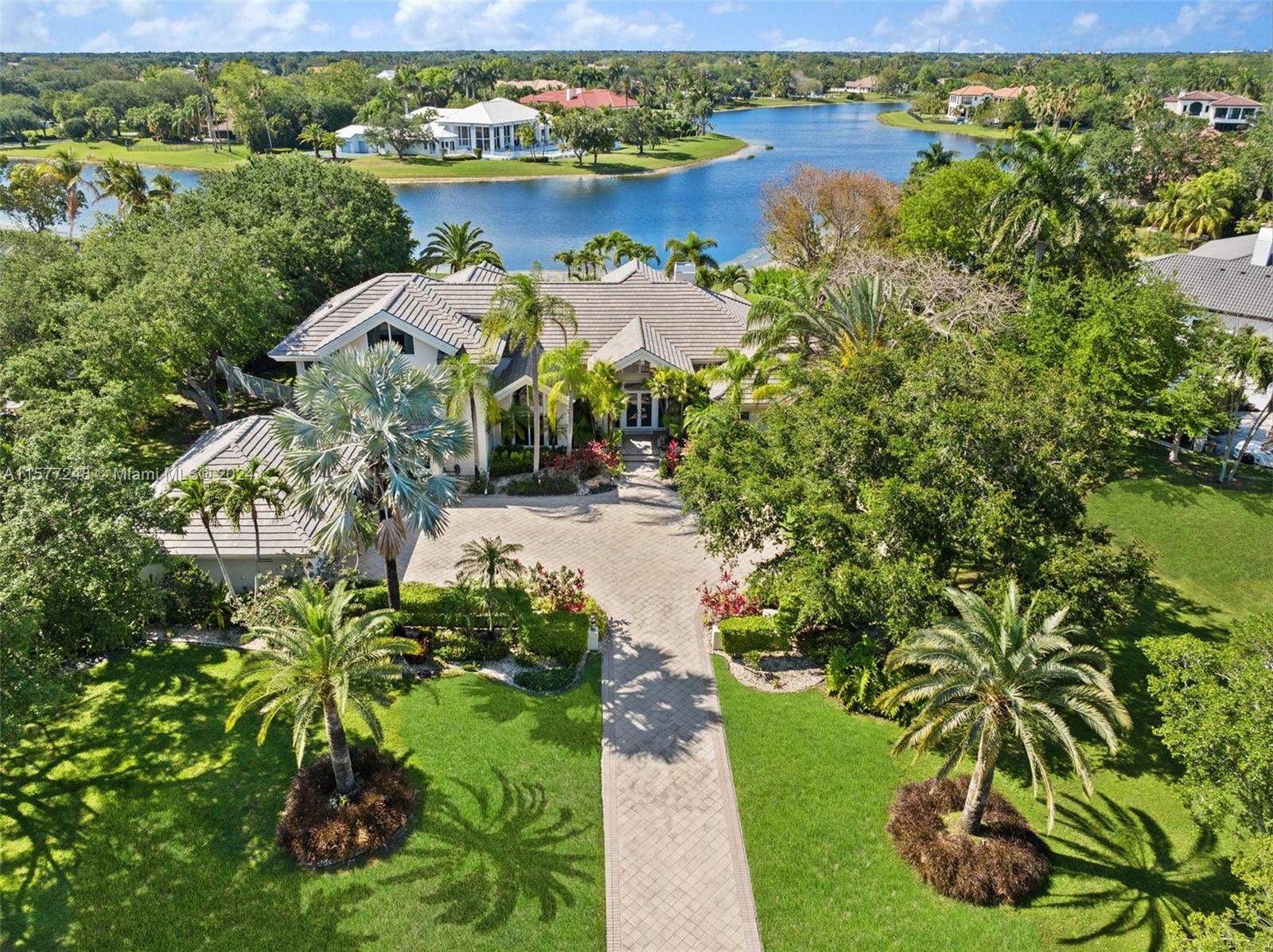 Windmill Ranch Estates
1.38 acre lake front property
5 bedrooms, 6 and 1/2 bathrooms, all bedrooms feature en suite full size bathrooms, 
Primary bedroom has 2 separate full size en suite bathrooms and walk in closets