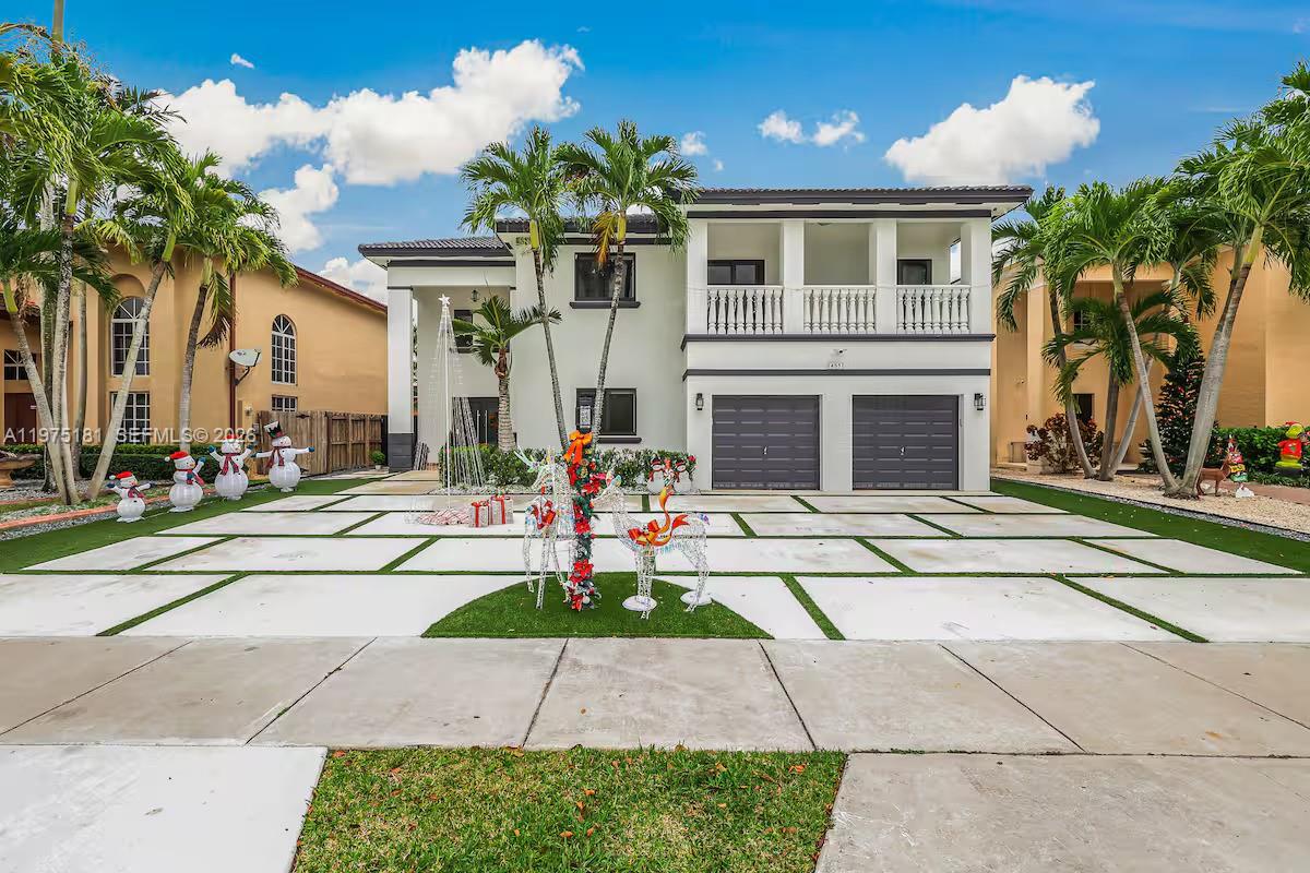 This beautifully updated residence features soaring double-height ceilings, expansive natural light, and a renovated kitchen with quartz countertops, custom cabinetry, stainless steel appliances, and an oversized island perfect for entertaining.

Major system upgrades include brand-new A/C units (2025), a new water heater (2025), a new pool heater, and a 24kW Generac whole-house standby generator with Wi-Fi capability, delivering uninterrupted power and ultimate peace of mind.

The private backyard oasis with pool and spa completes this exceptional South Florida retreat.