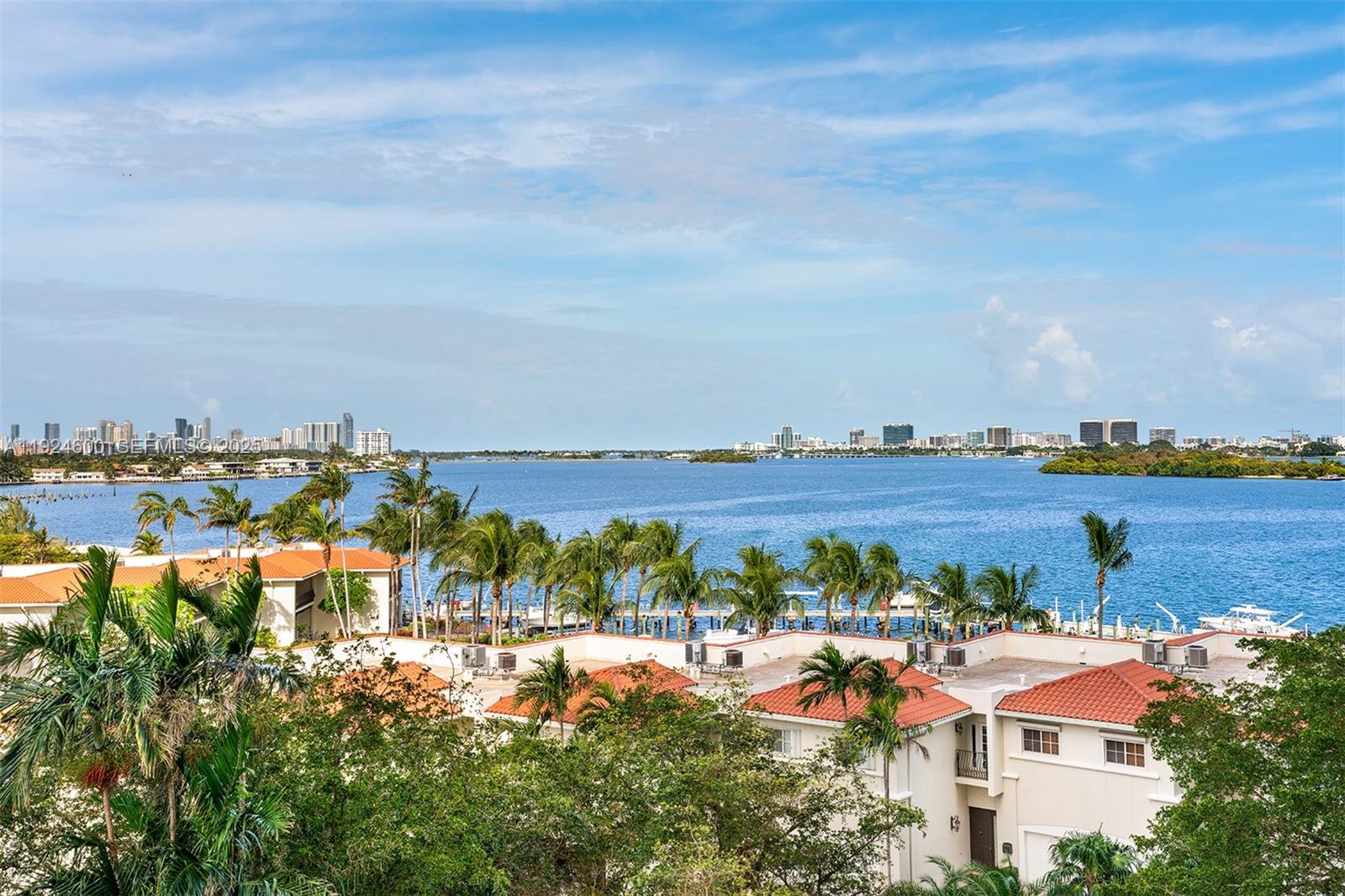 Discover Quayside, a hidden gem in Miami Shores. This home, with its 2 bedrooms and 2 bathrooms, features an expansive living area leading to a sizable balcony that presents stunning garden and bay views. Boasting a split floor plan, each room is filled with natural light. Live the hotel lifestyle and experience the amenities Quayside has to offer, including a full-service spa, tennis complex, heated swimming pools, a sports bar, and a restaurant with marina views. Enjoy the peace of mind provided by 24-hour security. This home is centrally located, just minutes away from both downtown and the beach.