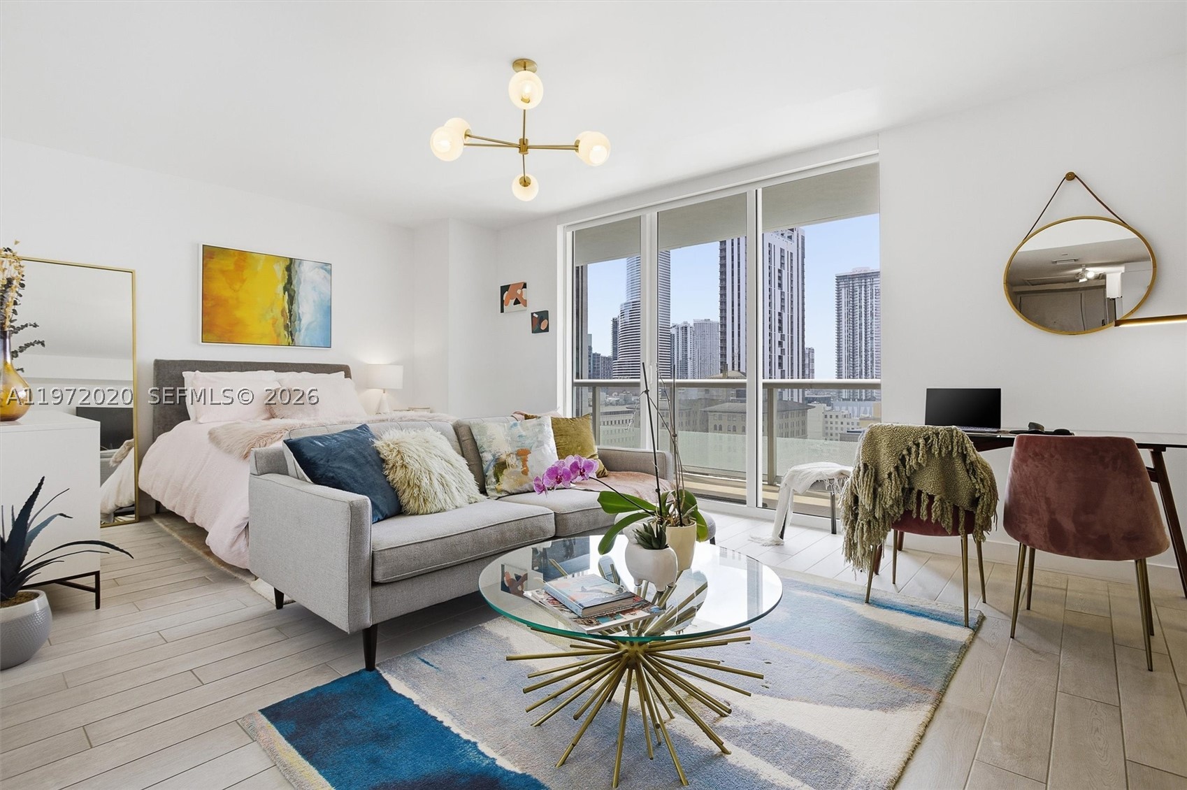 Spacious studio with updates and gorgeous West sunset views. New wood look alike tiles in a light gray, and white kitchen cabinets with a light stone counter top. All Bosch appliances, NEW dishwasher and refrigerator, as well as NEW stackable washer and dryer. Live in the center of DOWNTOWN MIAMI, a skip away from the Beach cswy, I-95, Brickell, Edgewater and the Performing Arts center. Downtown is evolving everyday. Surrounded by the Waldorf Astoria, the Aston Martin, and the Miami World Center, it is a solid investment. Great financial standing for the building, NO ASSESSMENTS.