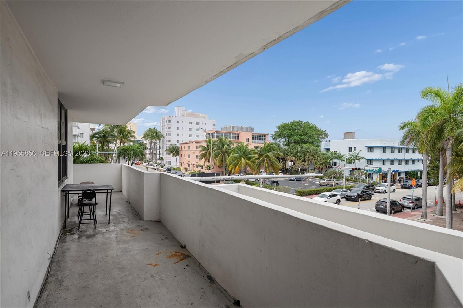 Spacious two bedroom, two bath, oceanfront building, corner unit with wrap around balcony views toward  the ocean and the city .  Step out of the building and stick your toes in the sand.  

With a little TLC, this could be the perfect seaside getaway!