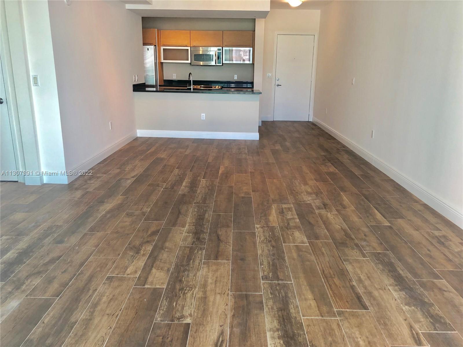 THE PLAZA 901 BRICKELL CO - Residential Lease