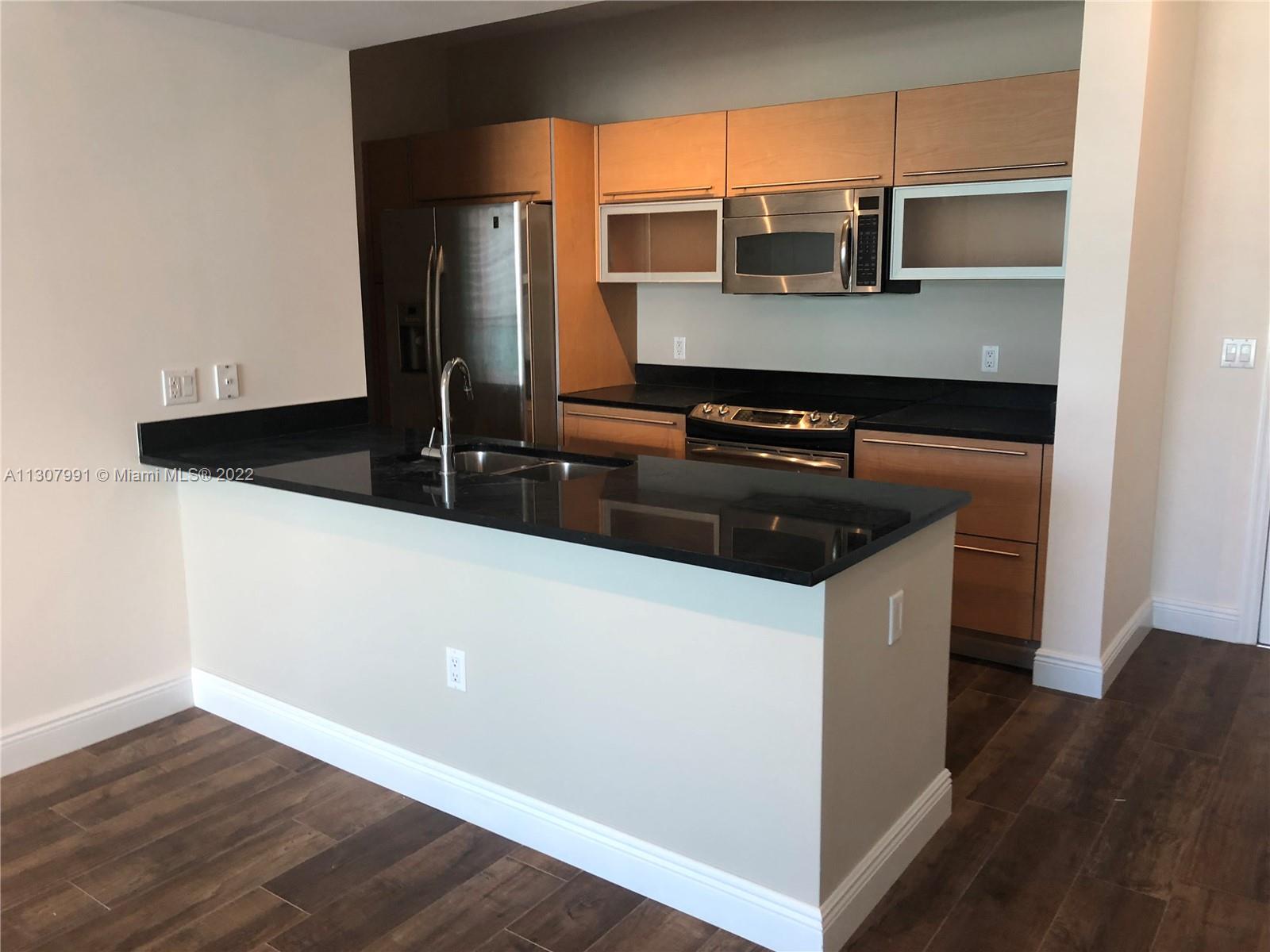 THE PLAZA 901 BRICKELL CO - Residential Lease
