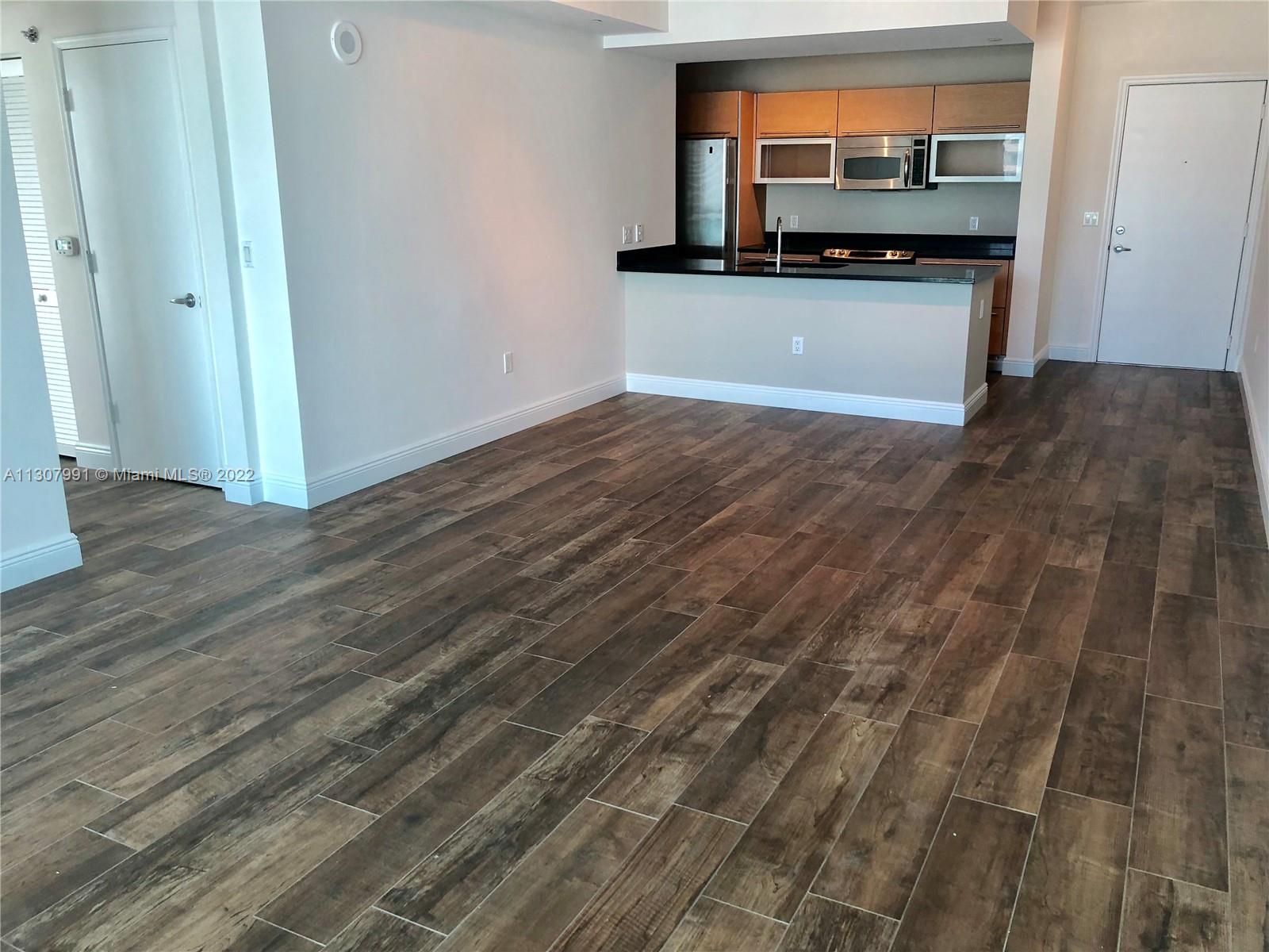 THE PLAZA 901 BRICKELL CO - Residential Lease