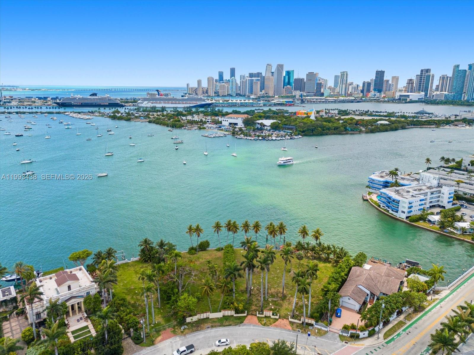 Rare waterfront property featuring over 103 feet of direct frontage on Biscayne Bay with direct downtown sunset views. With its prime location within the prestigious Venetian Islands, this remarkable vacant lot is approx. 13,382 sq feet land, capable of building a 10,705 SF+/- residence with a minimum of 3,485 SF+/- of green space, pool, dock. This one-of-a-kind opportunity allows you to create the waterfront dream estate you've always desired.