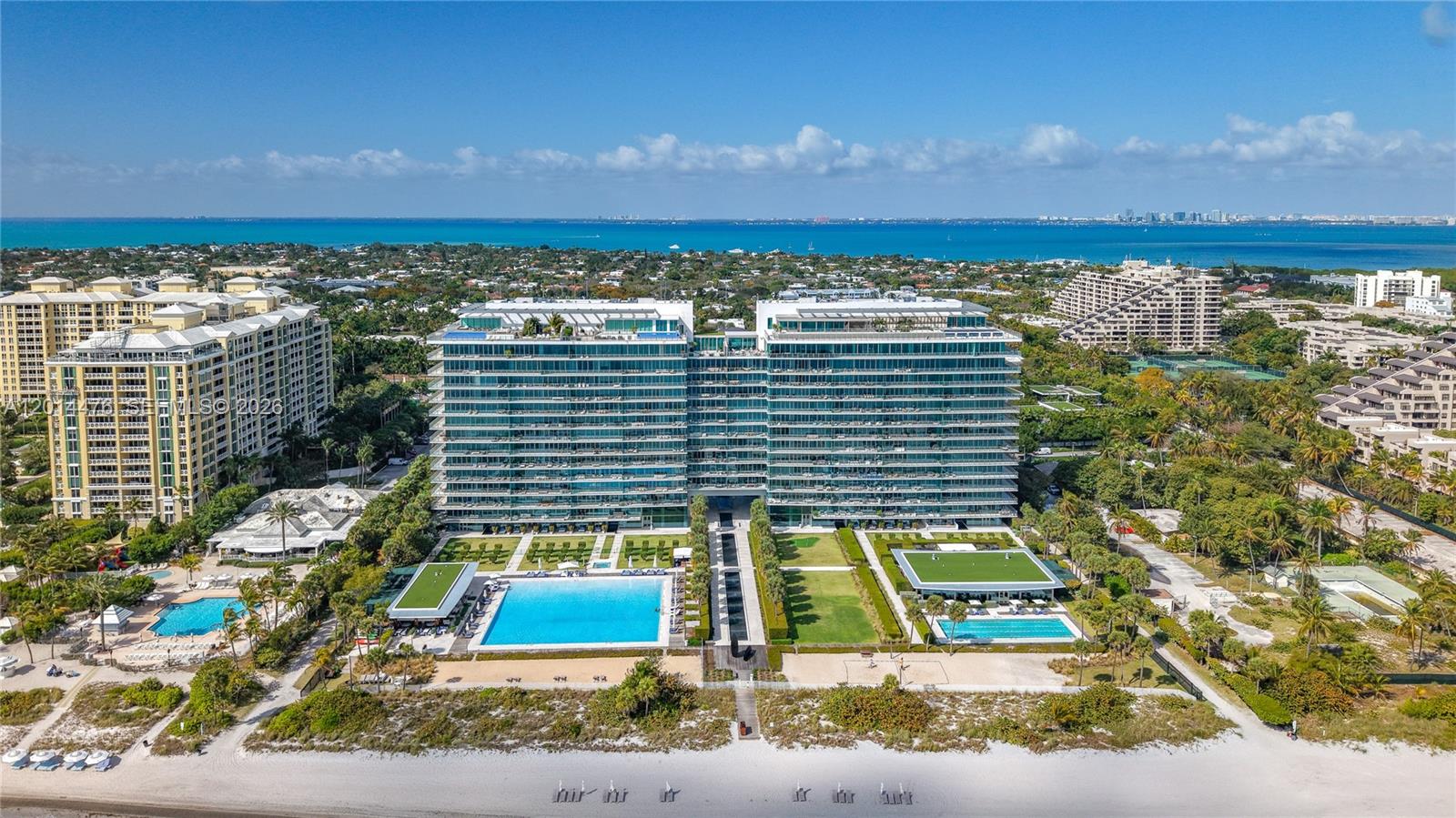 Experience elevated oceanfront living at this exceptional turnkey residence in the prestigious Oceana Key Biscayne. Located in the South Tower, Unit 1106S showcases breathtaking panoramic views of the Atlantic Ocean, Biscayne Bay & Miami skyline through dramatic floor-to-ceiling glass. Designed for the most discerning buyer, this impeccably finished residence offers expansive living areas, a private elevator foyer, two terraces, & refined contemporary interiors curated with the finest materials & furnishings. The kitchen features top-of-the-line appliances, custom cabinetry, & elegant finishes seamlessly integrated into sophisticated entertaining spaces. The luxurious primary suite offers stunning water views, custom closets, & a spa-inspired bath creating a true private retreat. Offered fully turnkey, this residence includes designer furnishings, curated décor, & even a brand-new golf cart for effortless island living. Oceana residents enjoy world-class amenities including private beach service, oceanfront pool, fitness center, spa, tennis courts, restaurant, concierge, valet, & 24hr security within one of South Florida’s most exclusive beachfront communities. A rare opportunity to own a move-in-ready luxury residence. Experience the unparalleled Key Biscayne lifestyle with private beaches, world-class tennis and golf, marinas, fine dining, biking trails, & vibrant yet exclusive island atmosphere minutes from Brickell, Coconut Grove, & Miami Int Airport.