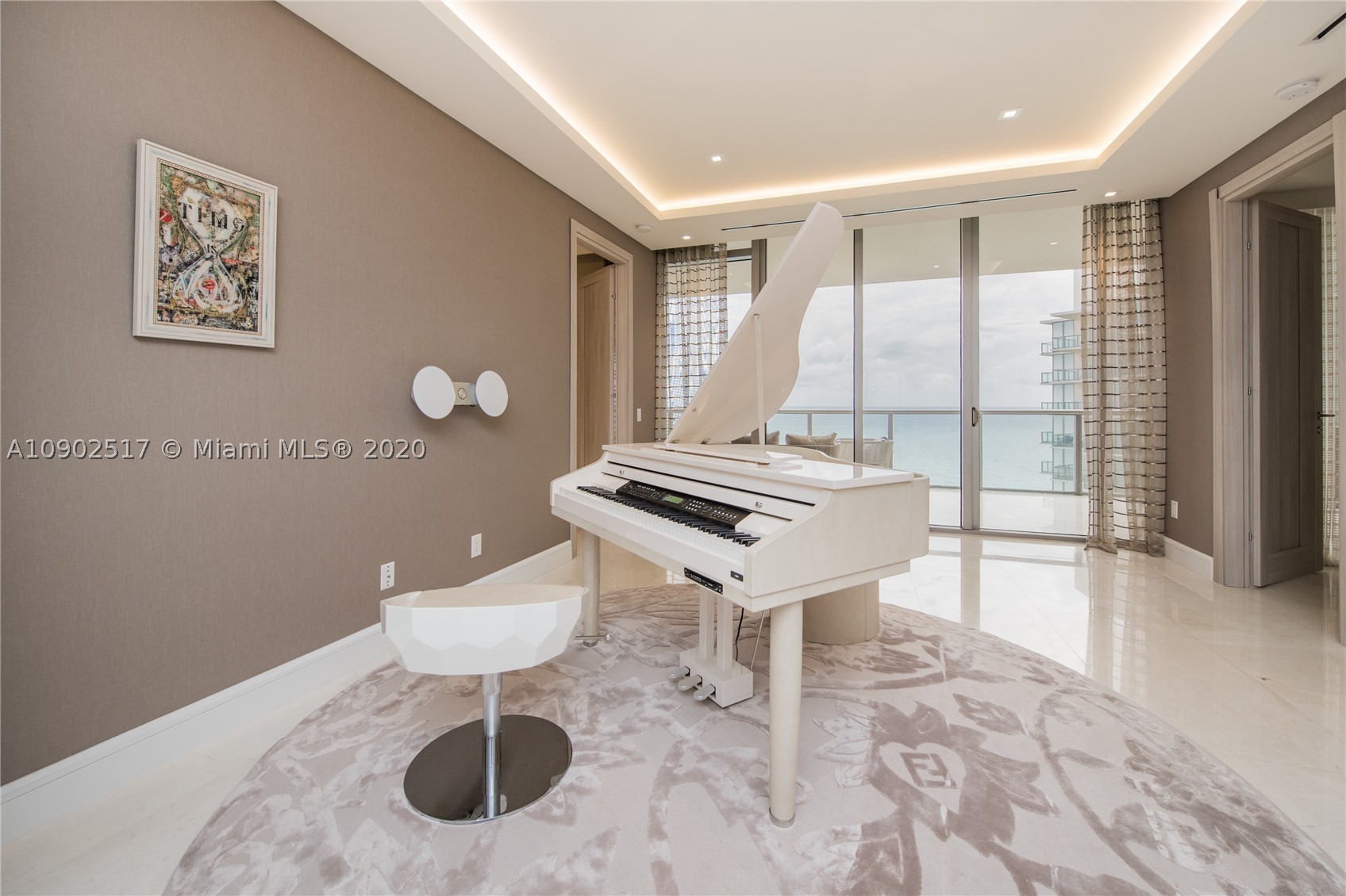 BACK ON THE MARKET!!! Spacious and sophisticated 3/3.5 residence in luxurious St Regis, right in the heart of Bal Harbour. The residence is professionally designed & decorated by well known designer Steven G, and includes all the finishes and touches, custom made art work, and accessories. The unit combines contemporary design with a range of textures in a soft, neutral color palette with 1st class panoramic ocean and city views.Bright and airy beach inspired concept brings wood tones, cozy fabrics, hi-end furnishings together, creates a breathtaking space and lifestyle! Enjoy the ultimate luxury living with 5 star hotel and resort and have exclusive access to amenities like private pools, concierge, oceanfront cabanas, and indulging spa!!!