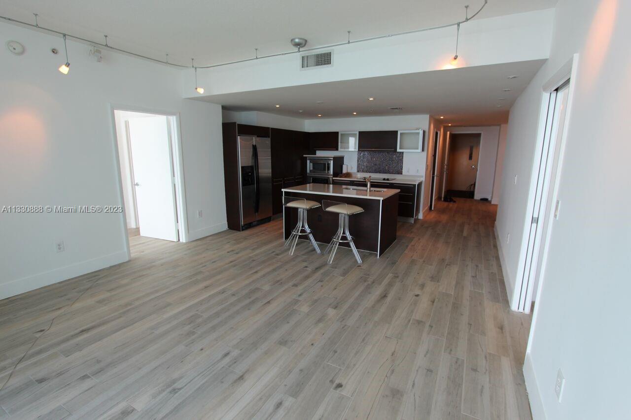Amazing panoramic bay/ocean city views from this beautiful 2 bed 2.5 bath + den unit. Unit comes with 2 parking spaces and a storage unit. Basic cable, water, and internet included. Quantum offers a state of the art 7,000 sqft gym, 2 pools, resident club house, movie theater, valet, and more. Very close to Downtown, Miami Beach, Wynwood, Art District, Midtown, and Airport. The park across the street offers tennis courts, basketball courts, volleyball, dog parks, and much more.