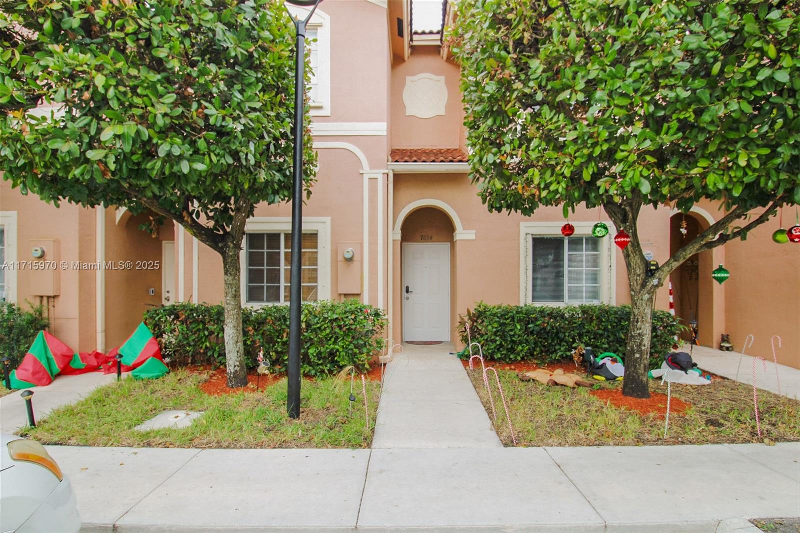 Spacious 3-bedroom, 3 Full-bath townhouse located in the desirable Catalina Lakes community of Tamarac. Featuring a NEW ROOF and NO special assessments! This all-ages community offers comfort and convenience with a mix of tile and wood flooring throughout. Enjoy a generous kitchen and family room perfect for relaxing or entertaining. The private patio overlooks the pool area and playground, creating a serene outdoor space. Ideally situated near top-rated schools, universities, shopping centers, dining, and recreational facilities. Easy access to major highways. Don’t miss the chance to make this beautiful townhouse your new home!