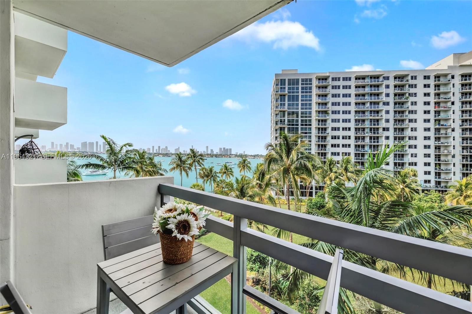 Amazing unit. Right in the heart of South Beach. Totally renovated with newer kitchen and bathroom Modern Italian style flooring. Turnkey and fully furnished. Beautiful view of the water/bay/skyline and quite tropical garden. Waterfront building with all the amenities, restaurant, mini market, beauty salon, juice bar, dry cleaner, state-of- the-art gym on 2 floors with classes. Perfect condo to live or rent out or both! Amazing Income w short term rental license. Minimum rental 30 days. Tenant occupied.