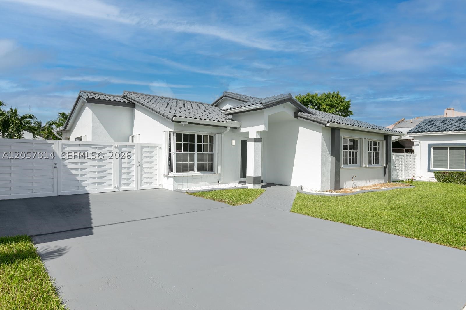 This beautifully remodeled 3-bedroom, 2-bathroom home offers 1,704 total sq. ft. with a bright and modern design. Spacious property perfect for comfortable living and new kitchen and appliances perfect for entertaining. The large gate lot provides ample space to park a boat or RV, making it ideal for outdoor enthusiasts. Enjoy a private backyard for relaxation or gatherings in a serene setting. Conveniently located near top schools, shopping, dining, and major highways, this home blends comfort and elegance in a highly desirable Miami area. Don’t miss the chance to own this exceptional property! - New roller shades window treatments have been installed after photos were taken.