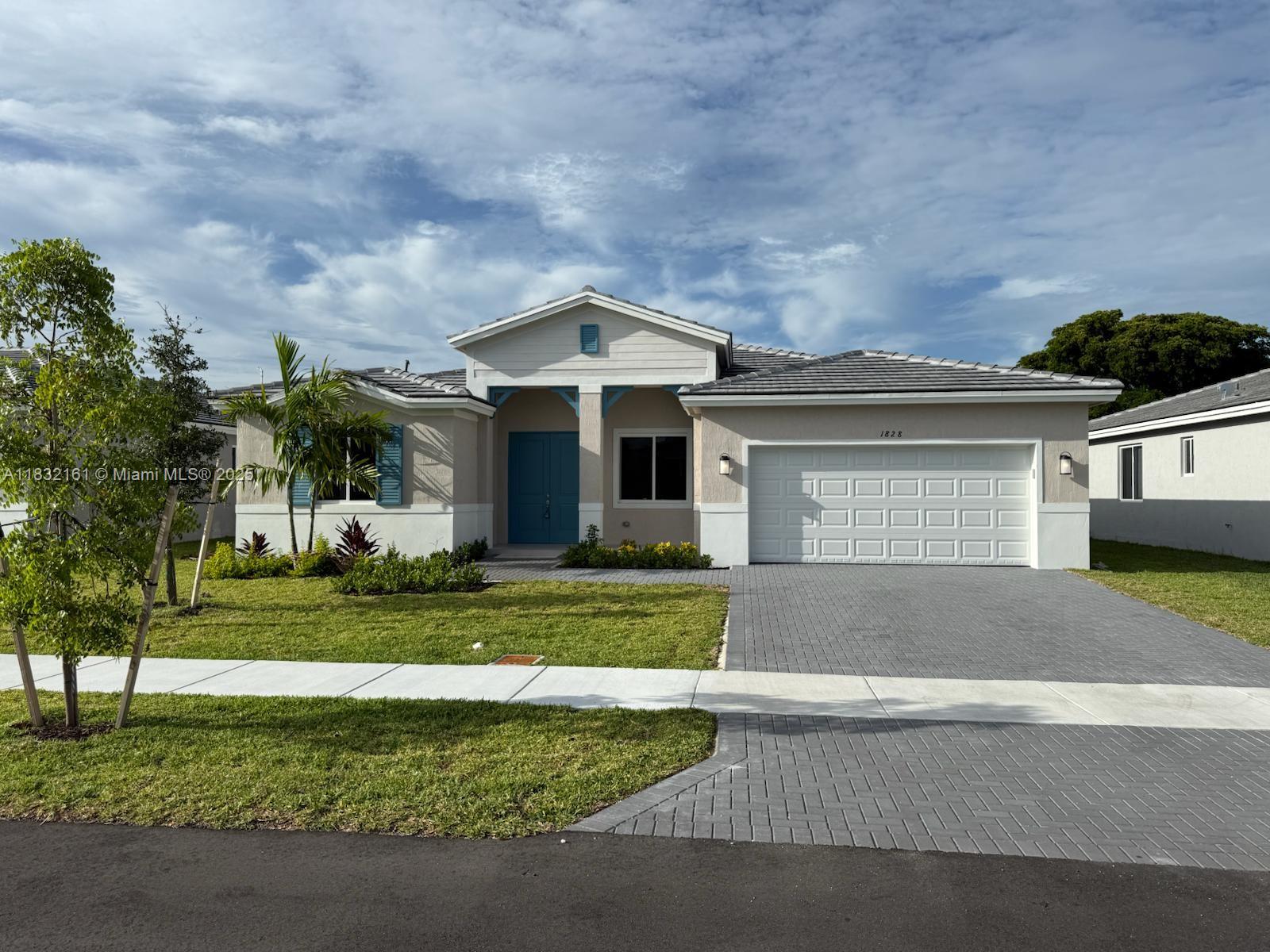 Price Reduced! FHA-approved new construction offering up to 6% in seller incentives — ask how buyers may qualify for as little as ~$800 total cash to close when using the preferred lender (per builder incentive sheet).

Introducing the Jasmine Model at Tropical Villas — a spacious 4-bedroom, 3-bath home with 2,280 SqFt of A/C living space and 2,780 total SqFt, thoughtfully designed for modern living. This new construction features an open-concept kitchen and family room, a dedicated dining area, and a split bedroom layout that offers comfort and privacy for everyone.

The primary suite includes a large walk-in closet and a beautifully finished bath with dual sinks and a walk-in shower. Bedroom 4 functions as a junior suite with nearby full bath access—ideal for guests, in-laws, or a private office. Tile flooring spans all main living areas for durability and style, with carpet only in the bedrooms.

Situated on a generous 7,500 SF cul-de-sac lot, this home offers excellent curb appeal, impact windows, a 2-car garage, a covered entry, and a private backyard with space to entertain or personalize.

Builder incentives include: closing cost credits, waived fees, and utility hookup savings—making this one of Homestead’s most attainable new-construction opportunities. Close to shopping, dining, parks, and major commuter routes.

Move-in ready—schedule your showing today.