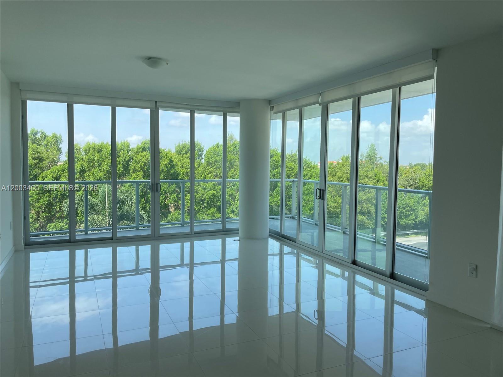 HOT NEW LISTING: Rare opportunity to own the largest 3-bedroom + DEN layout in Doral. This expansive residence offers 3 full baths + powder room and 1,906 SQ FT under AC, with a versatile DEN easily convertible into a 4th bedroom. Designed for modern living, it features an open gourmet kitchen with Italian cabinetry, Bosch stainless steel appliances, smart home technology, and an oversized quartz island perfect for entertaining. Bright, open living and dining areas flow through telescopic impact glass doors into a huge wraparound balcony.

Premium finishes include porcelain floors, roller blinds, sleek bathrooms with frameless glass showers, upgraded washer/dryer, and generous closet space. Enjoy 2 assigned covered parking spaces, plus guest parking, and a large private storage cage conveniently located just steps from your door. Prime location near top schools, shopping, dining, and major highways. Tenant-occupied—advance notice required.