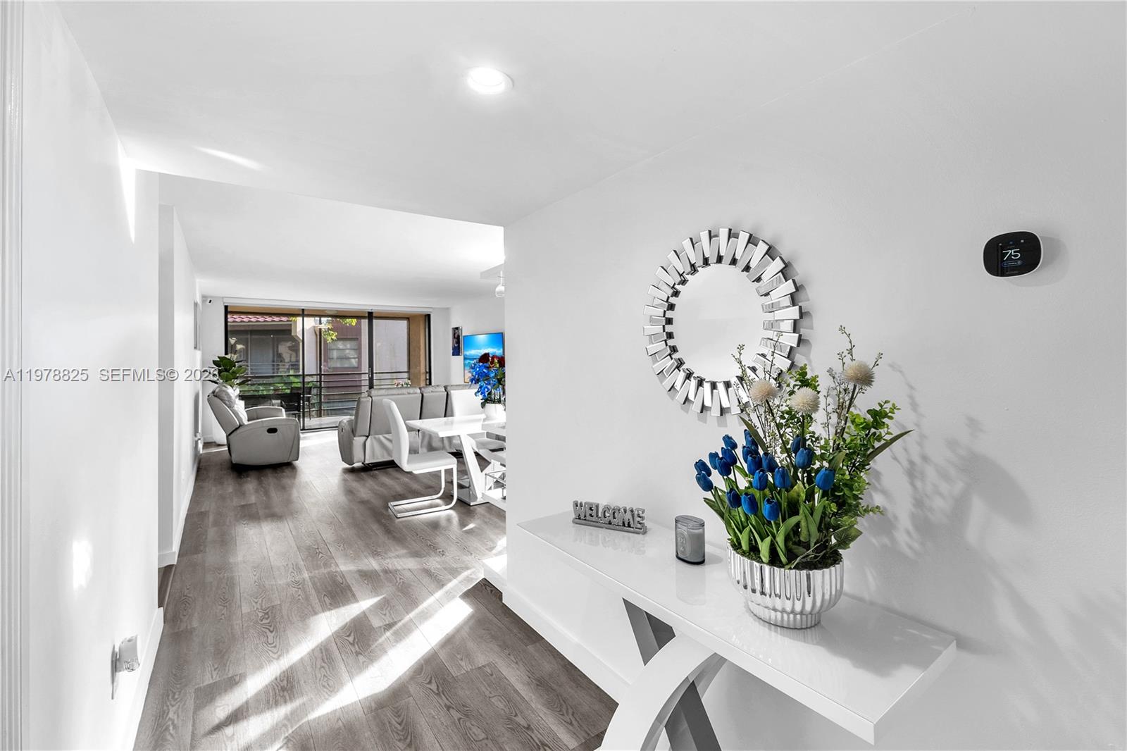 RARE OPPORTUNITY FOR 5% DOWN ON A CONDO! Come see this beautifully remodeled corner unit! A well-maintained 1 bedroom 1.5 bathroom apartment with updated floors, bathrooms and kitchen complete with lovely wine cooler. Bedroom has spacious walk-in closet and unit has oversized screened-in balcony with convenient entrances from the living room and bedroom. Washer and dryer in unit. Hurricane impact windows. Ample parking available. Close to shopping and highways. Association requires 600 credit score minimum. 95% financing available through our lender.