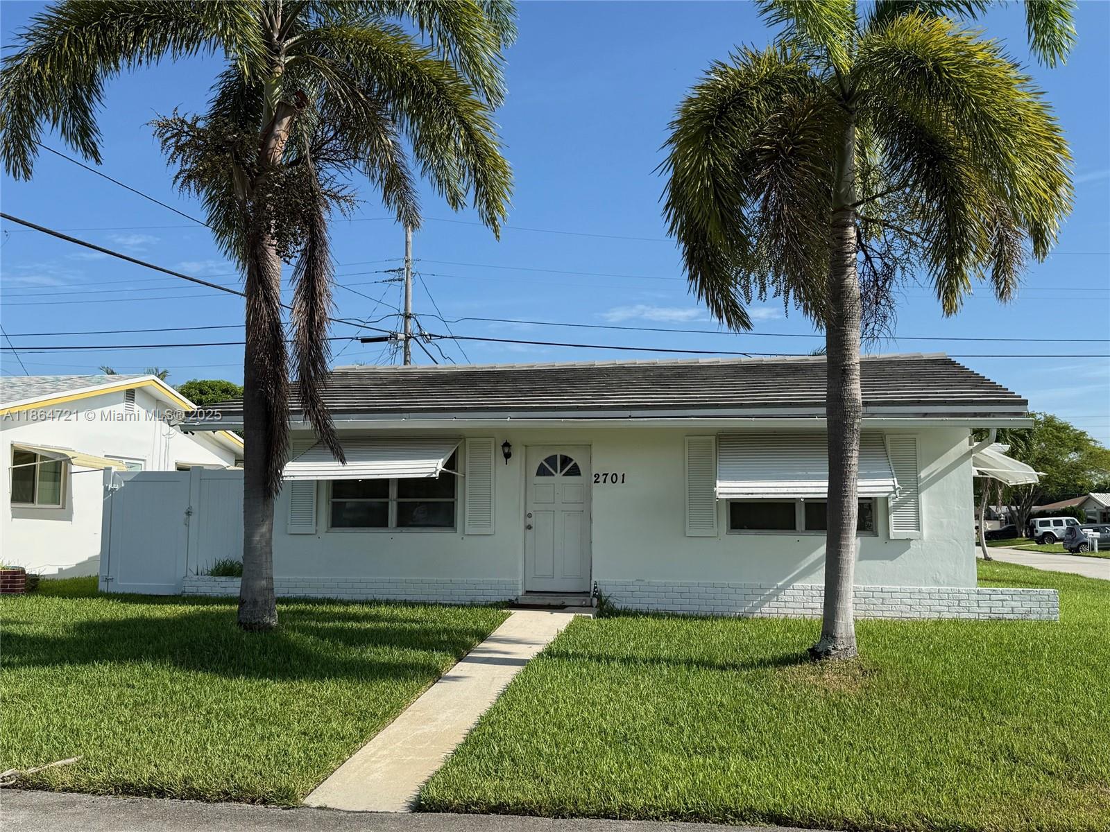 Discover this delightful 2-bedroom,1-bath single-family home tucked away in the peaceful Tamarac Lakes North community. This charming one-story residence is a true "diamond in the rough," offering waterproof laminate flooring, full-size appliances, central A/C, and a fenced yard & a carport.  Inside, you'll find an inviting open kitchen seamlessly connecting the main living area to the dining and family rooms, plus a convenient laundry room with full-size washer and dryer.  The community enhances your lifestyle with amenities such as a clubhouse, pool, and lawn and sprinkler services.  Ideally located just minutes from the beaches, Uptown Fort Lauderdale, Tri-Rail, shopping, and the airport this property makes an ideal starter home or investment opportunity.  Don't miss this rare find!