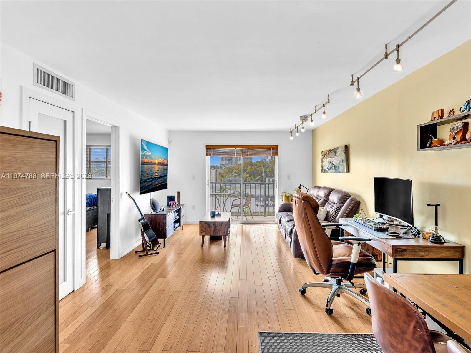 Amazing opportunity to own a beautiful 1-bedroom residence on Alton Road in Miami Beach! This highly sought-after 02 line offers stunning park and city views from every room and will not last. Enjoy a spacious floor plan featuring tasteful updates throughout, including custom cabinetry, stainless steel Jenn-Air appliances, brand new dishwasher, granite countertops, bamboo hardwood flooring, wine cooler. Electric tankless water heater. The unit features a generous walk-in closet, 1.5 bathrooms, and one assigned covered parking space. Recently maintained A/C unit for added peace of mind. Super low maintenance fees, all special assessments paid in full, and the  40-year inspection is in process. Ideally located in a dynamic yet relaxed setting, just steps from everyday conveniences and minutes to Lincoln Road in the heart of South Beach. Dear for Investors. NO RENTAL RESTRICTIONS. Owner motivated send your offer!