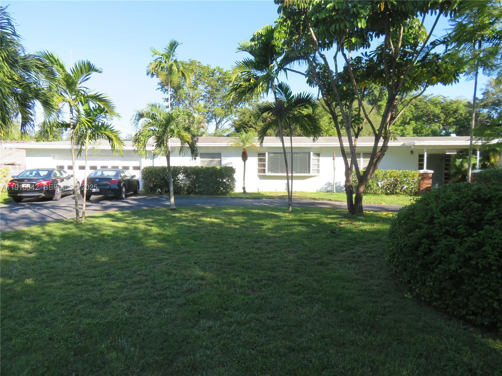 38,768 square foot lot in the quiet area of Pinecrest, This 3/3 home can be added on too or torn down.  House is occupied.  Please do not disturb tenants.  Please call listing agent for more details.