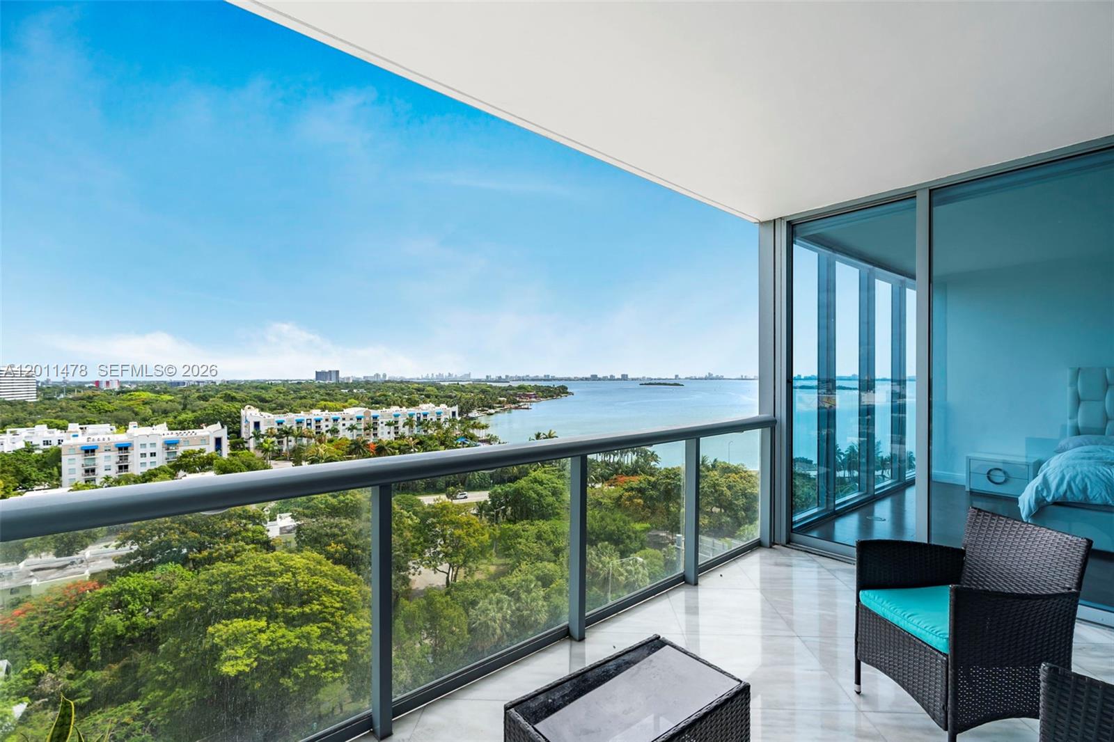 OCEAN VIEW 2 Bed 2.5 Bath, with front and back windows offering extensive natural light and air flow. The unit has NEW Cooktop and Fridge, a 4-year-old AC Unit, BRAND NEW washer & dryer and recently polished floors. Primary Bedroom offers a WALK-IN CLOSET, floor-to-ceiling windows, and access to the balcony. Primary bath includes double sinks, bidet and Shower/Tub Combination. Washer and Dryer in the unit. The BUILDING is located in the MOST CONVENIENT lot of Edgewater with unobstructed ocean via and instant access to the beach or highway. Walking distance to Midtown and Design District, 9 min to the Beach, 15 min to the Airport. FEATURES: gym, sauna, heated pools, jacuzzi, BBQ area, movies & billiard rooms, business center, children's play area, dog park, 24-hour security, additional valet parking for owners, and mini market. Great for end users and investors.