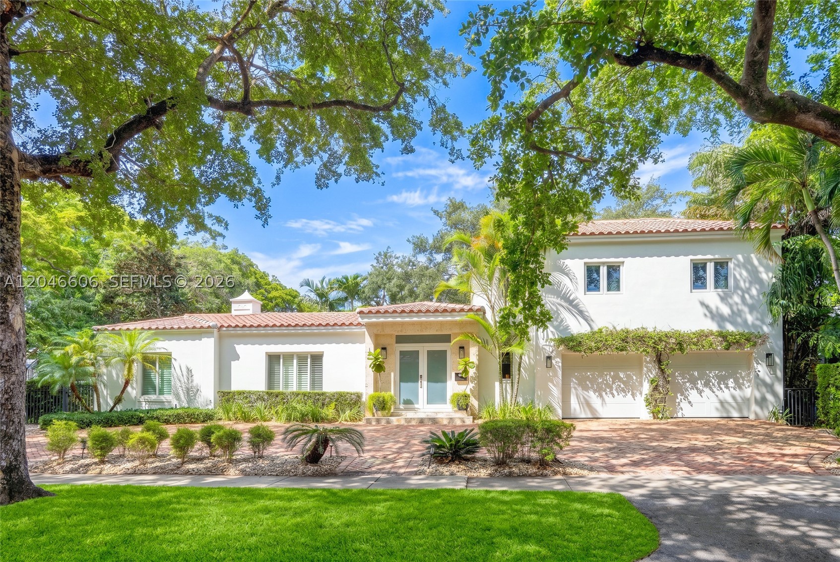 Exceptional Coral Gables residence just moments from The Plaza, Ponce Circle Park, Miracle Mile, and the Youth Center. This beautifully finished home features soaring high ceilings, elegant designer details, a separate guest house, and a private office ideal for working from home. The spectacular backyard is a true showpiece, with lush landscaping and magazine-worthy outdoor living reminiscent of what you would see in Architectural Digest—perfect for relaxing or entertaining in style.