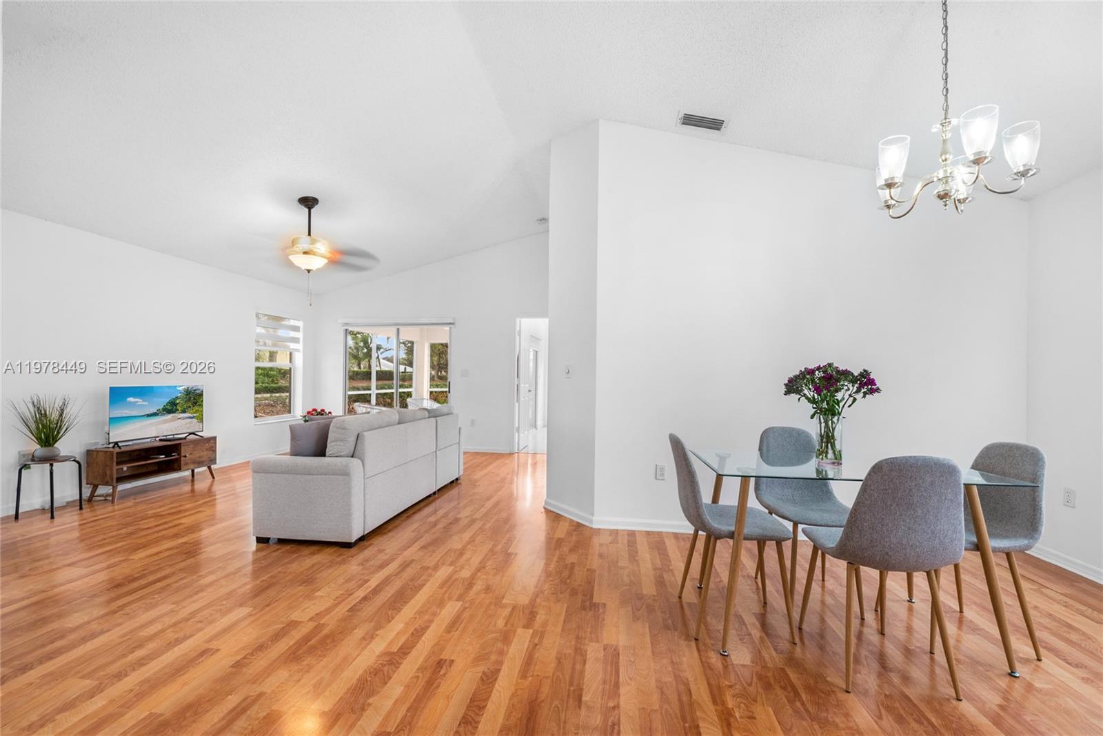 Stunning Lake view home from almost every room. The Open plan makes this light and bright house feel very spacious! The updates completed in this property includes new floors, newer roof installed 2019, Newer AC and appliances from 2016. renovated second bathroom. Brand New Zebra blinds for privacy. Enjoy resort like living in this beautiful and tranquil community with beautiful trees and walking paths. Amenities like pools, club house and plenty of activities arranged by the staff makes this community fun to live in, or vacation.
Close to commute, Baptist hospital, shopping and the nicest restaurants in Homestead.