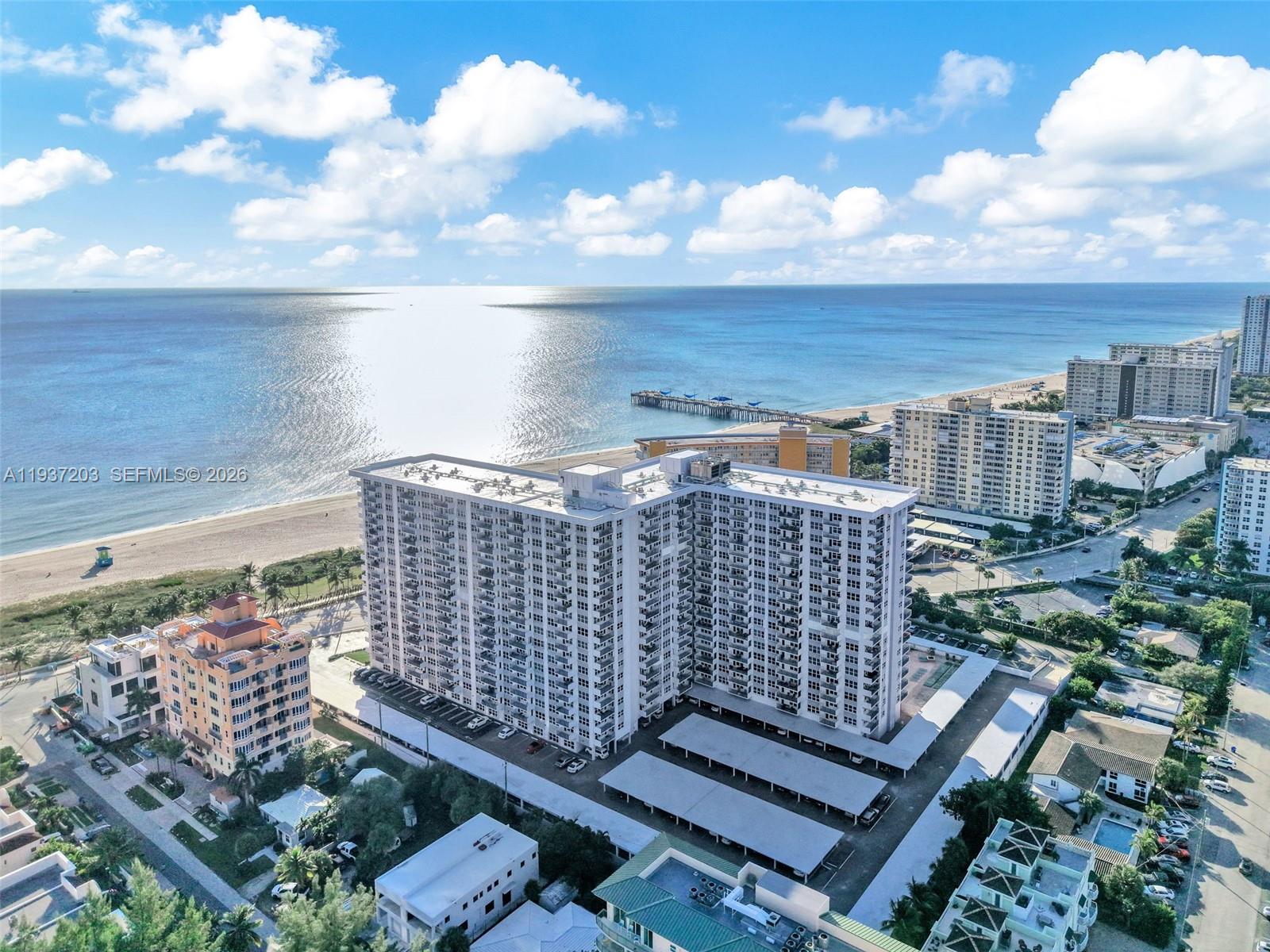 Spectacular Fully Furnished Studio on A1A—Steps from the Ocean!
Enjoy coastal living in the heart of Pompano Beach, directly across the street from the beach and walking distance to the Pompano Beach Pier, restaurants, shopping, and entertainment. This beautifully maintained building has undergone major upgrades, including a recently remodeled exterior and lobby, roof replaced in 2025, and healthy reserves, offering peace of mind and long-term value.

The thoughtfully designed studio features impact windows, granite countertops, flat-top stove, custom wall storage, and a gorgeous bathroom with a large modern shower, finished to perfection.

Resort-style amenities include a heated pool, sauna, fitness center, clubroom, card room, meeting room, library, and a large game room with billiards, air hockey, ping pong, shuffleboard, and vending machines. Outdoor amenities feature BBQ areas and tiki huts. Additional conveniences include a 24-hour front desk/doorman, laundry rooms on every floor, storage spaces, and assigned and guest parking.

Cable and internet included. Low HOA approx. $350/month. Whether used as a full-time residence or a lock-and-leave vacation retreat, this is a rare opportunity to own near the ocean in one of South Florida’s most dynamic coastal communities. Leasing allowed after 3 years. Sold AS-IS.