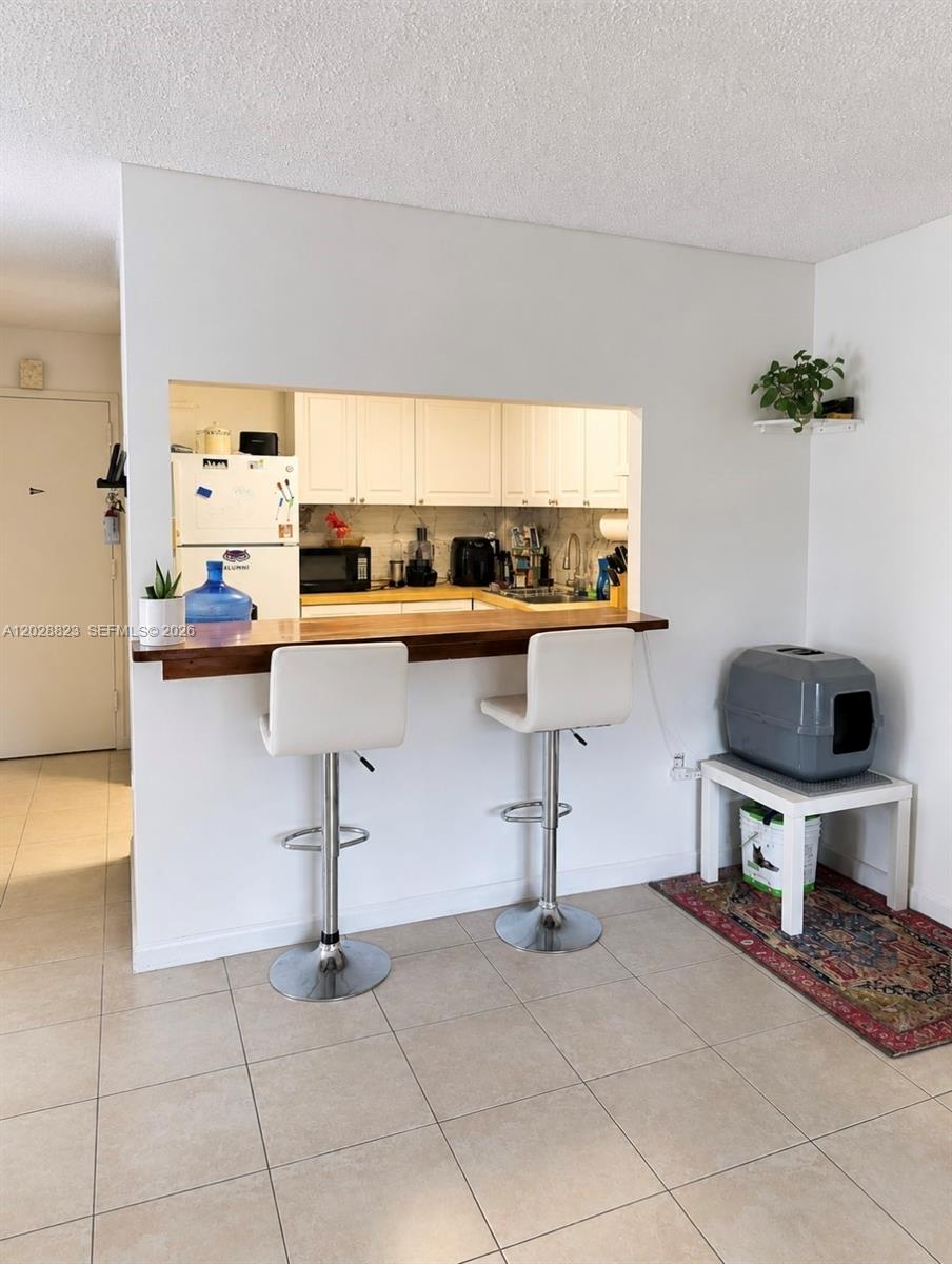 WOODSIDE APTS CONDO - Residential Lease
