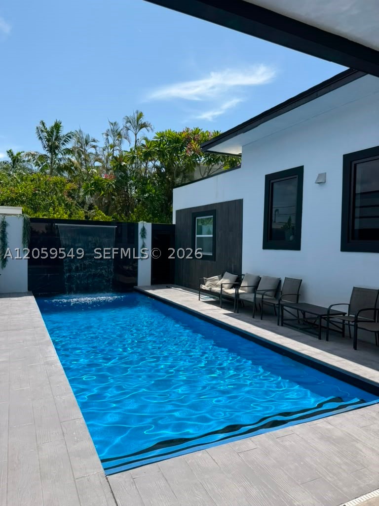 Brand-New Luxury Home with Guest House in Dania Beach! Completed in 2025, this exceptional modern residence at 224 SW 12th St, Dania Beach, FL 33004 offers luxury and style. The 2,060 SF main home features 4 bedrooms and 4 bathrooms with an open-concept layout, high ceilings, abundant natural light, designer finishes, a gourmet kitchen, premium appliances, and spacious living and dining areas.
A separate 926 SF guest house includes 2 bedrooms and 2 bathrooms, making it ideal for extended family, guests, or rental income potential.
Enjoy your own private backyard oasis with a sparkling swimming pool and ample space for outdoor entertaining and relaxation.
Conveniently located just minutes from beaches, Dania Pointe, Fort Lauderdale-Hollywood International Airport, major highways, shopping, dining, and entertainment, this property offers the perfect blend of luxury living and investment potential.
A rare opportunity to own a brand-new contemporary home with a separate guest house in one of South Florida's most desirable locations!