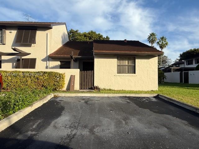 PRICE IMPROVEMENT! AVAILABLE NOW AND READY TO SALE - Desirable and spacious 2-bedroom, 2-bath corner townhouse in Calusa Point. Features include a large screened patio and a bright interior atrium that fills the home with natural light. The split floor plan offers privacy, complemented by a generously sized kitchen, abundant closet space, and ample storage throughout.

Conveniently located near major highways and public transportation. The community offers a gated entrance with 24-hour security and resort-style amenities including a swimming pool, tennis courts, basketball court, playground, and more.

Priced to sell — don’t miss this opportunity!