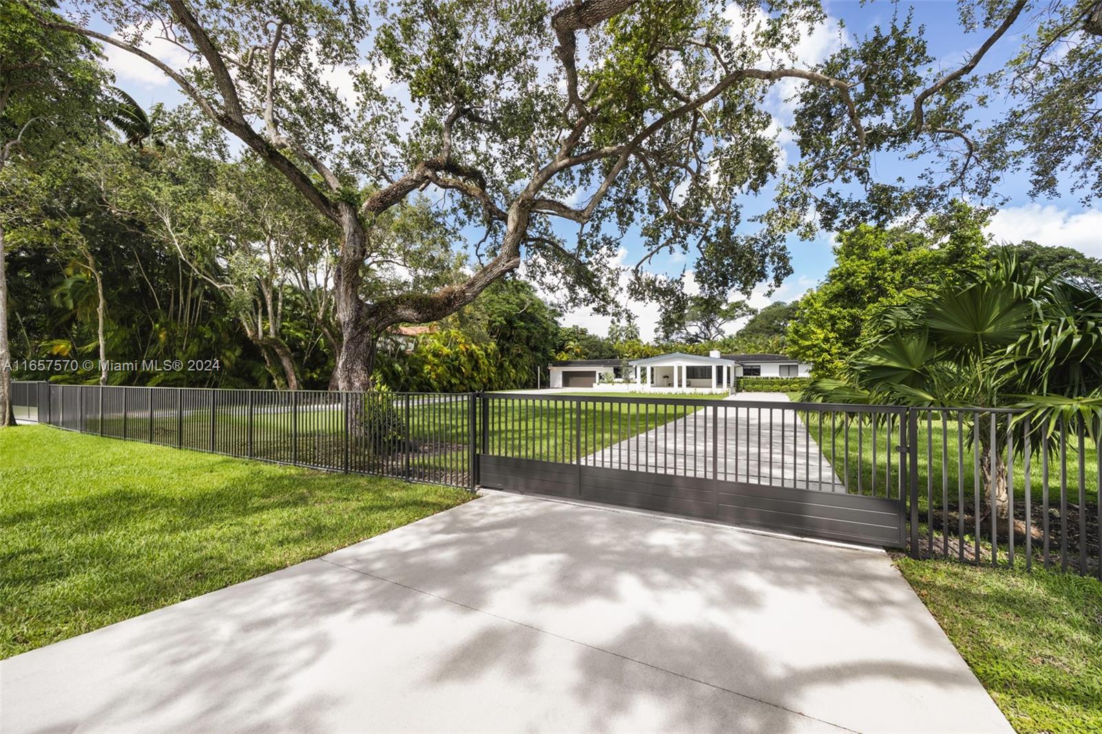 Discover unparalleled luxury in this 2024 fully remodeled 4 bedrooms + spacious office/den, 4-bath designer home, set on nearly 1 acre in North Pinecrest. Featuring high-end finishes, an Italian kitchen, and marble countertops throughout, this residence offers exceptional style and comfort.

The spacious layout includes a luxurious master suite, a versatile den, and an outdoor oasis with a private pool, spa, cabana bath, and expansive terrace—perfect for entertaining and relaxation.

Conveniently located near top schools and amenities, this home blends elegance with practicality. Dont miss this opportunity!!