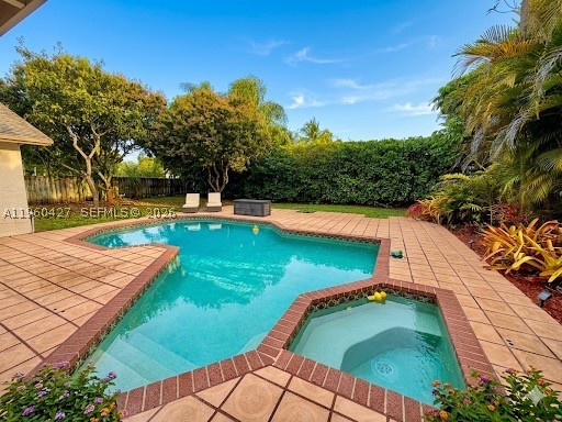 PRICE REDUCTION! UNBEATABLE VALUE & THE LOWEST-PRICED SINGLE-FAMILY HOME IN SOUGHT-AFTER KILLIAN PINES! Don't miss this incredible opportunity to own a true gem with amazing space. The home measures approximately 2,185 sq. ft., making it larger than stated on the tax roll—offering the ultimate price-per-square-foot value in the neighborhood! Nestled on an expansive, fully fenced lot, this property features a sparkling pool and lush, mature fruit trees, creating a private backyard oasis with limitless potential. Inside, the spacious 3-bedroom, 2-bathroom layout includes a versatile private office that can easily serve as a 4th bedroom. Character abounds throughout, highlighted by stunning wood-beam vaulted ceilings and a massive family room designed for effortless entertaining and seamless indoor-outdoor living. While the property awaits your personal updates, it has been priced aggressively for an immediate sale. Bring your design vision, update to your taste, and instantly build massive equity in one of the area’s most desirable pockets. Ideally situated in a prime location just minutes from MDC Kendall, fine dining, top schools, and shopping. Exceptional space, an oversized lot, and an unbeatable price—seize this rare neighborhood value and schedule your private tour today!