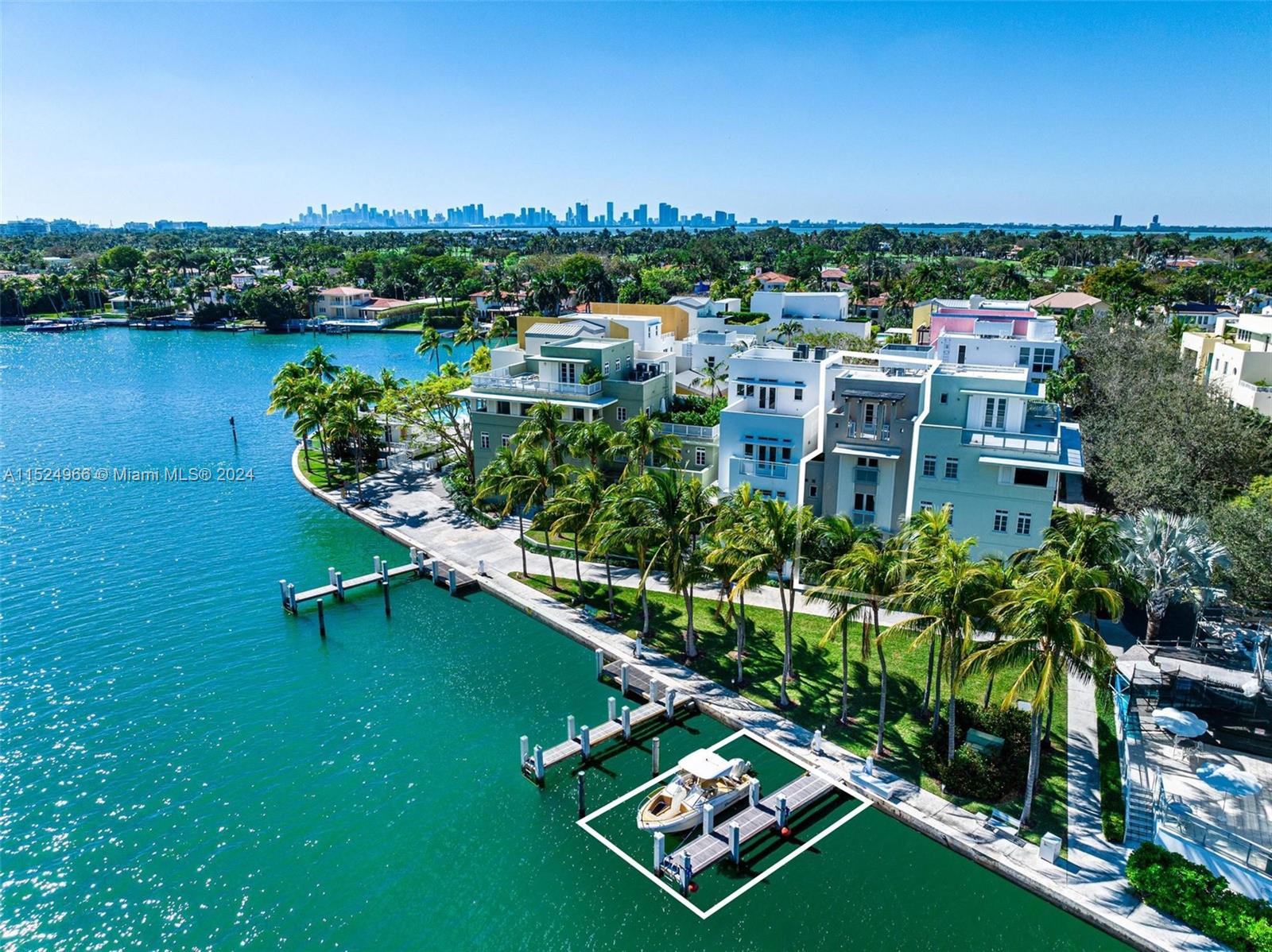 Another Collectable Property! Exceptional waterfront townhouse at Aqua Allison Island, Miami Beach. Modern luxury spans 3,733 sq ft indoors, 1,127 sq ft terraces, four beds, plus den and five baths. Recently remodel with top-tier finishes. 1st floor: new custom kitchen, living, dining, bar area, courtyard, + ½ bath. 2nd floor: two beds with en-suites, plus den/media area. 3rd floor: master suite, walk-in closet, two terraces. 4th floor: office/guest room, full bath, wet bar, two rooftops. Private elevator accesses all floors. Includes 30 ft boat slip, two-car garage. Exclusive gated community, amenities: two pools, fitness center and spa, playroom, 24/7 security, concierge, valet. The perfect blend of a single-family home, with privacy, situated within a gated island community!
