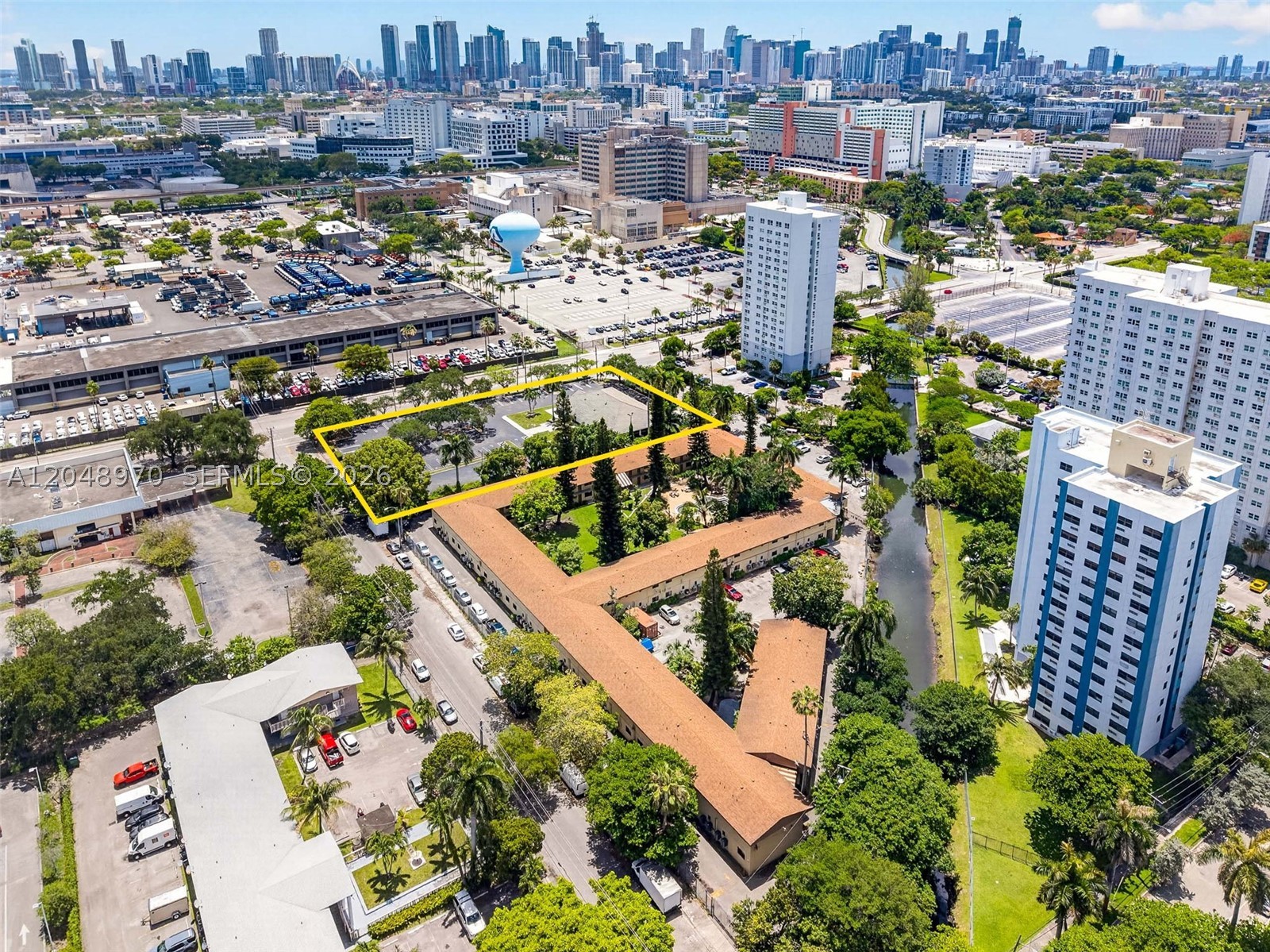 District 19 presents a rare 1.21-acre (52,925 SF) development opportunity in the heart of Miami’s rapidly transforming Allapattah neighborhood. Boasting three-sided street frontage, the site offers exceptional visibility, multiple points of access, and added flexibility for future site planning and development. Positioned directly adjacent to the Miami Health District and just west of Wynwood, the property benefits from one of South Florida's strongest institutional employment centers while sitting at the forefront of Miami’s continued westward urban expansion. Jackson Memorial Hospital, the University of Miami Miller School of Medicine, the VA Medical Center, & Miami Dade College’s Medical Campus are all within walking distance, creating a sustainable foundation for future residential demand. River Landing, Downtown Miami, and Miami International Airport are all easily accessible via nearby major roadways and Metrorail Station.

Zoned T6-8-O, allows development of up to 182 residential units by right (approx 8–12 stories). Under Florida’s Live Local Act, the property may qualify for substantially greater density by incorporating workforce housing increasing potential to 20+ stories and ±1,200+ residential units (buyer to independently verify). The existing ±5,617 SF single-tenant building is currently occupied and will be delivered vacant at closing. District 19 represents one of the few remaining large-scale infill development opportunities in Miami’s urban core.