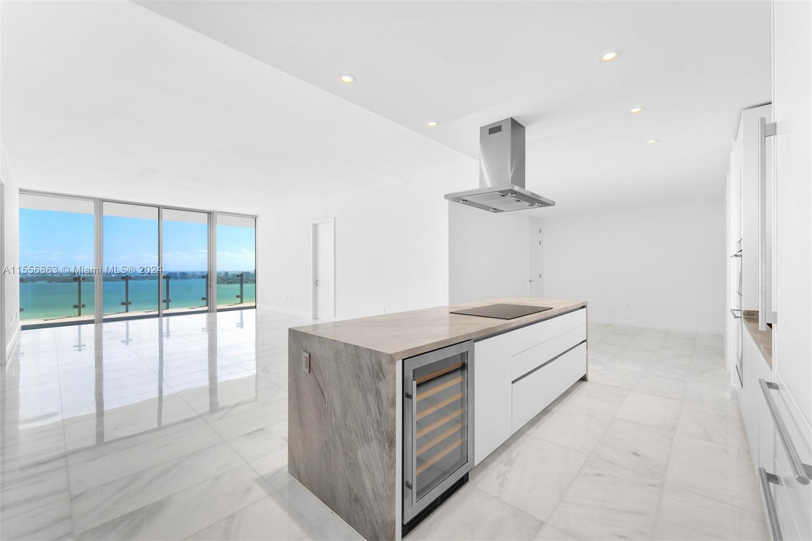 Experience unparalleled luxury living in the heart of Edgewater with unobstructed bay views at the new Missoni building. This exquisite 2-bedroom unit boasts a den that can easily be transformed into a third bedroom complete with a closet and full bath. Beyond its spacious layout, enjoy the convenience of a private elevator entrance, world-class amenities, large laundry room, and in-unit storage.Coveted unit featuring a generous 2,347 SF of interior space, complemented by a sizable balcony, totaling an impressive 2,935 SF. Buyer to receive credit for custom closet installations and den conversion for potential 3rd bedroom. Step out onto expansive balconies to soak in the breathtaking vistas and elevate your lifestyle to new heights. Easy to show call Monica for all showing appointments.