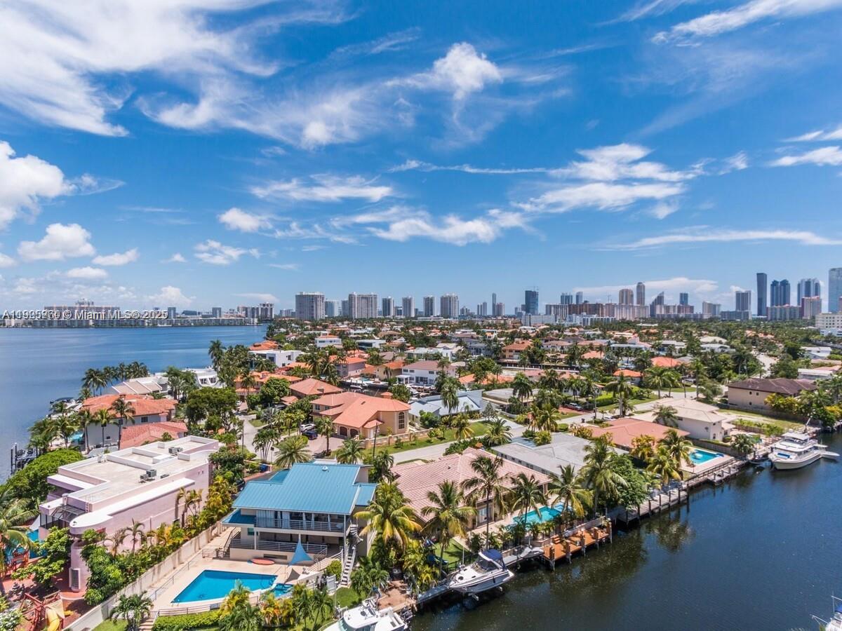 Bright TOP FLOOR 1/1.5 condo with UNOBSTRUCTED WATER VIEWS from every room, and breathtaking nighttime skyline views. The home features a large balcony, porcelain floor, plenty of space with 3 built in closets. Amenities include heated pool, BBQ area, and a small gym. Watch dolphins, eagle rays, manatees, and boats pass by. Amazing location minutes to fine dining & shopping, Aventura & Bal Harbour shops, across from Oleta park, 5 minutes to Sunny Isles & Haulover Beach, to IPic theatre, gym, yoga, supermarkets, FIU, Costco. One parking space, no pets. A/C replacement in 2024. Tenant occupied. PLEASE READ BROKER REMARKS