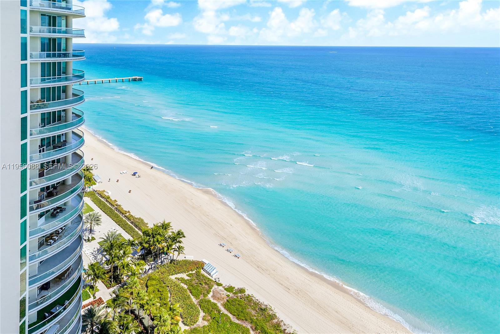 Enjoy refined oceanfront living in this spacious 2-bedroom + den, 3-bathroom residence with stunning, unobstructed ocean views. Offering approximately 1,964 sq ft of interior space, the layout flows seamlessly for comfortable living and entertaining.
Floor-to-ceiling windows bring in natural light throughout, complemented by marble flooring and private elevator access directly into the residence. The modern kitchen features premium appliances, Italian-style cabinetry, and granite countertops.
The primary suite offers a serene retreat with a spa-inspired bathroom and walk-in closet. Each additional bedroom includes its own ensuite bath, providing privacy and comfort. Expansive balconies extend the living areas outdoors, showcasing beautiful sunrise and sunset views.
Residents enjoy resort-style amenities including beach service, oceanfront pool deck, fitness center, spa and sauna, valet parking, concierge, and 24-hour security.
A timeless oceanfront residence designed for elevated everyday living.