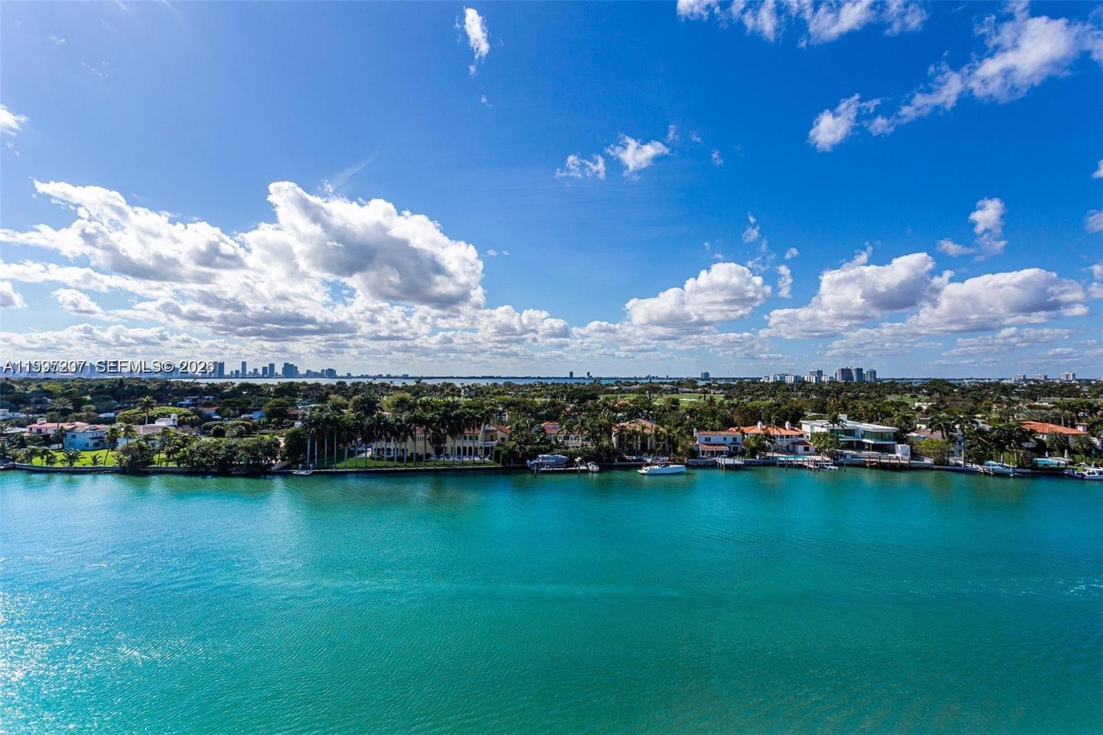 DISCOVER THE JOY OF LIVING IN 2/2 WITH BREATHTAKING VIEWS OF INDIAN CREEK INTRACOASTAL, BISCAYNE BAY & MIAMI SKYLINE FROM BOTH BEDROOMS AND BALCONY. WATER VIEWS FROM EVERYWERE.  THE UNIT HAS A SPACIOUS LIVINGROOM AREA AND A HUGE MASTER BEDROOM. OPEN KITCHEN W/ SS APPLIANCES, WASHER/DRYER IN THE UNIT. NEW LAMINATE FLOORS THROUGHOUT. 1 ASSIGNED PARKING SPACE & 1 STORAGE UNIT. BUILDING IS LOCATED ON MILLIONAIRE'S ROW, ONLY FEW STEEPS FROM THE BEACH. AMENITIES INCLUDES STATE OF THE ART FITNESS CENTER, POOL 24/7 DOORMAN, RESTAURANT, MARINA & MUCH MORE.HIGH SPEED INTERNET, PREMIUM CABLE TV, WATER & A/C ARE INCLUDED IN THE DUES. EASY TO SHOW ANYTIME. TEXT LA.