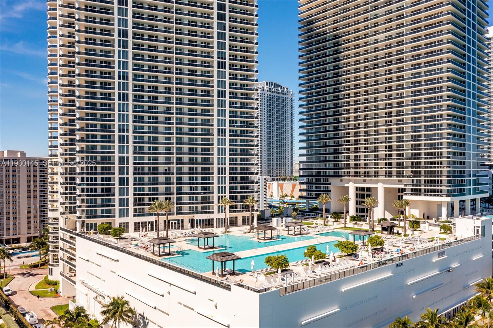 Experience breathtaking OCEAN VIEW from the 44th floor in this stunning residence at The Beach Club, featuring a large private balcony accessible from both the living area and the bedroom. This beautifully Unfurnished updated condo offers 2 full bedrooms, 2 bathroom, washer & dryer in unit, 1 assigned garage parking space, 1 valet parking space, and a private storage unit located on the 11th floor. Interior highlights include sleek porcelain floors and a flexible layout. 

The Beach Club is a premier five-star oceanfront community offering an unmatched lifestyle with a 40,000 sq. ft. luxury spa and fitness center with cold pledges and more, multiple resort-style pools with full bar / Food service and poolside service, 24-hour concierge and security, beach service and Chairs, and 810 ft. of pristine ocean frontage one the beach. Enjoy modern amenities, direct beach access, and world-class service in one of Hallandale Beach’s most desirable towers.

Ideal as a primary rental, vacation retreat (6 month Min.), this high-floor residence delivers exceptional comfort, luxury, and oceanfront living. Easy to show and move-in ready!