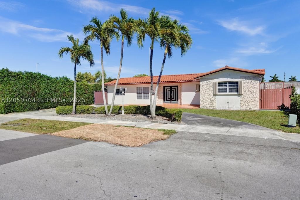 Don’t miss this exceptional opportunity to own a spacious 5-bedroom, 4-bathroom single-family pool home in the desirable Southern Estates community. Offering over 2,200 square feet of living space, this home features tile flooring throughout, two beautifully renovated bathrooms and the rare advantage of two primary suites—ideal for extended family, in-law quarters, or added privacy. Enjoy a private backyard oasis with a swimming pool and no rear neighbors, creating a peaceful and secluded setting. This home offers plenty of space, versatility and privacy. An opportunity you won’t want to miss!