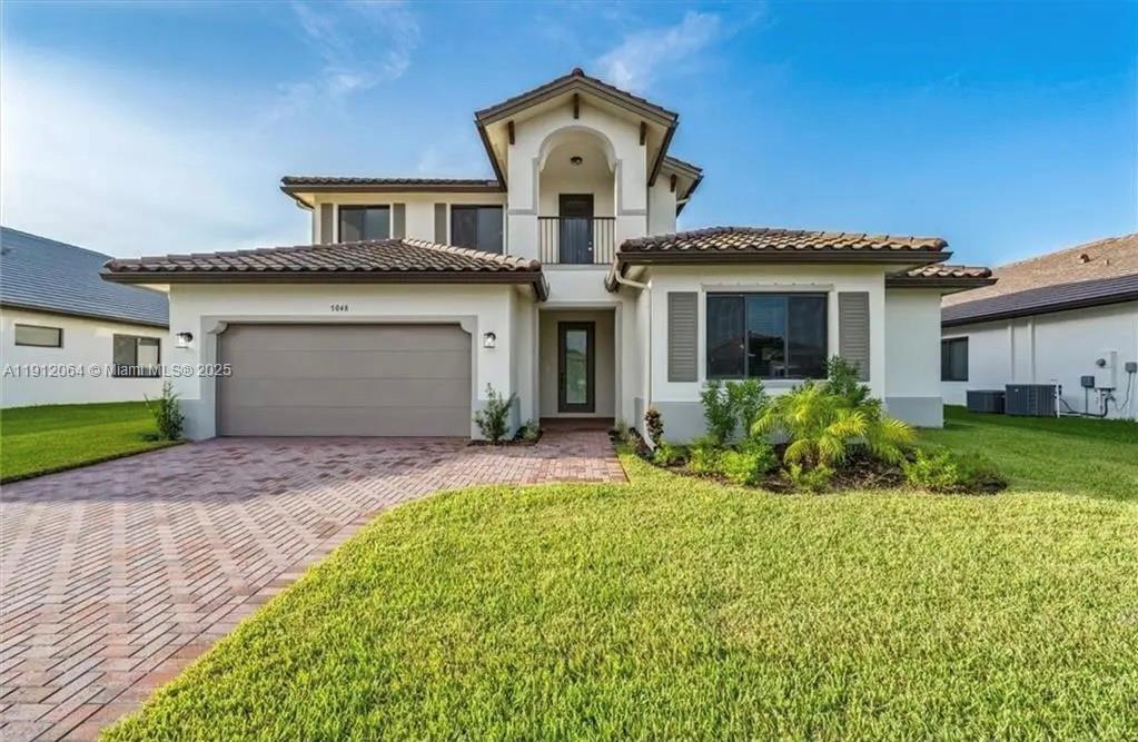 Stunning single-family home in the heart of Ave Maria featuring 5 bedrooms, 4 bathrooms, a first-floor owner’s suite, great room, loft, and a 2-car garage. Open-concept floor plan with soaring ceilings, oversized windows, and a spacious chef’s kitchen. Upscale finishes include designer tile flooring, quartz or granite countertops, European-style cabinetry, and Kohler faucets. Situated on an oversized lot, this home offers plenty of outdoor space. Enjoy the community amenities with clubhouse, pool, scenic lakes, walking trails, and bike paths. Located near excellent schools, shopping, dining, and recreation—perfect for modern family living.