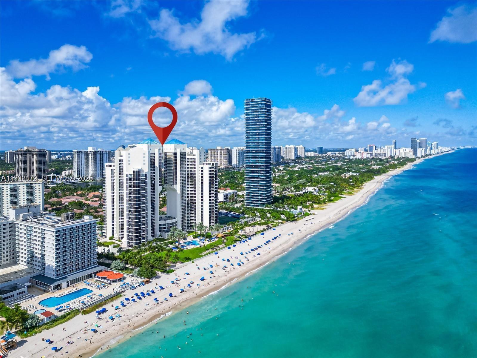 Outstanding 3-bedroom, 4.5-bathroom corner residence at Ocean One Condominium with direct beach access. This spacious unit offers 2,026 sq ft of living area, featuring floor-to-ceiling windows that fill the home with natural light and showcase partial ocean views.
The expansive primary suite is bright and inviting, complemented by a luxurious primary bathroom with double sinks, jacuzzi tub, and a large window. The kitchen offers abundant storage space, ideal for both everyday living and entertaining. Each secondary bedroom is designed as a private suite, providing comfort and privacy.
Enjoy resort-style living with premium amenities including 24-hour security and valet, tennis courts, spa, heated beachfront pool, private beach cabanas, and an on-site restaurant.