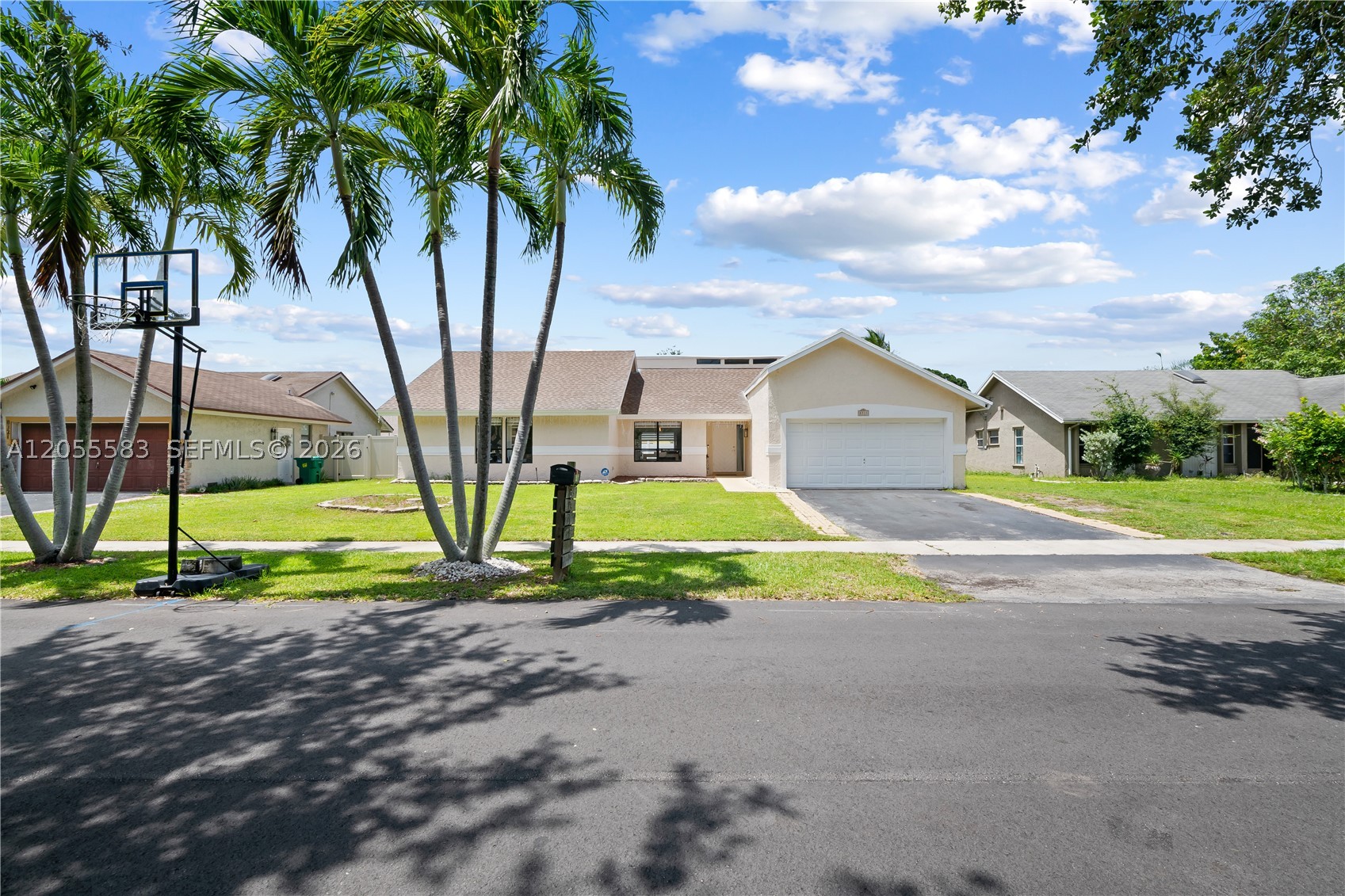 Updated 4-bedroom, 2-bath pool home located in Lauderhill. Interior updates include a remodeled kitchen with quartz countertops, stainless steel appliances, renovated bathrooms with quartz vanities, upgraded wood flooring, modern light fixtures, fresh interior paint, and smooth ceilings with the popcorn finish removed. Additional improvements include a newer central A/C system, new plumbing fixtures, and a new pool motor. The home also features a split bedroom layout for added privacy.  The oversized pool and in the backyard can become your personal retreat after adding your personal touches.  Fully fenced.  Conveniently located near University Drive, Florida's Turnpike, Sawgrass Expressway, shopping, dining, parks, schools, and Sawgrass Mills.  Seller Motivated.