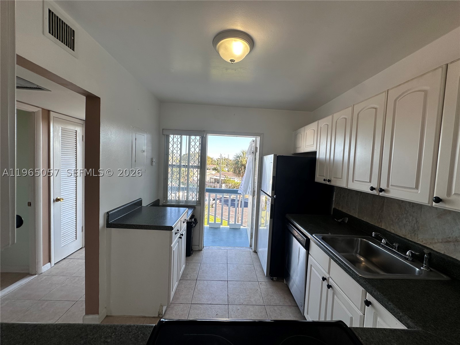 Great Unit in Central Hollywood location. 1 Bedroom 1 bathroom, in a vibrant 55+ community. The unit features tiled floors throughout, screened-in balcony overlooking a garden view, on demand hot water from tank-less water-heater, the front offers direct views of the lake. The unit is freshly painted and has a brand new refrigerator, new front and kitchen hurricane impact doors and is ready for immediate move in. Parking spot is assigned to the unit with additional guest parking spaces. Laundry facility on the floor. The community has undergone renovations and upgrades to the exterior of the building.  As well as the pool, clubhouse, and a new community dock for fishing or relaxing. Major shopping, freeway access and hospital all located with a short distance, located within 1 mile of memorial hospital.