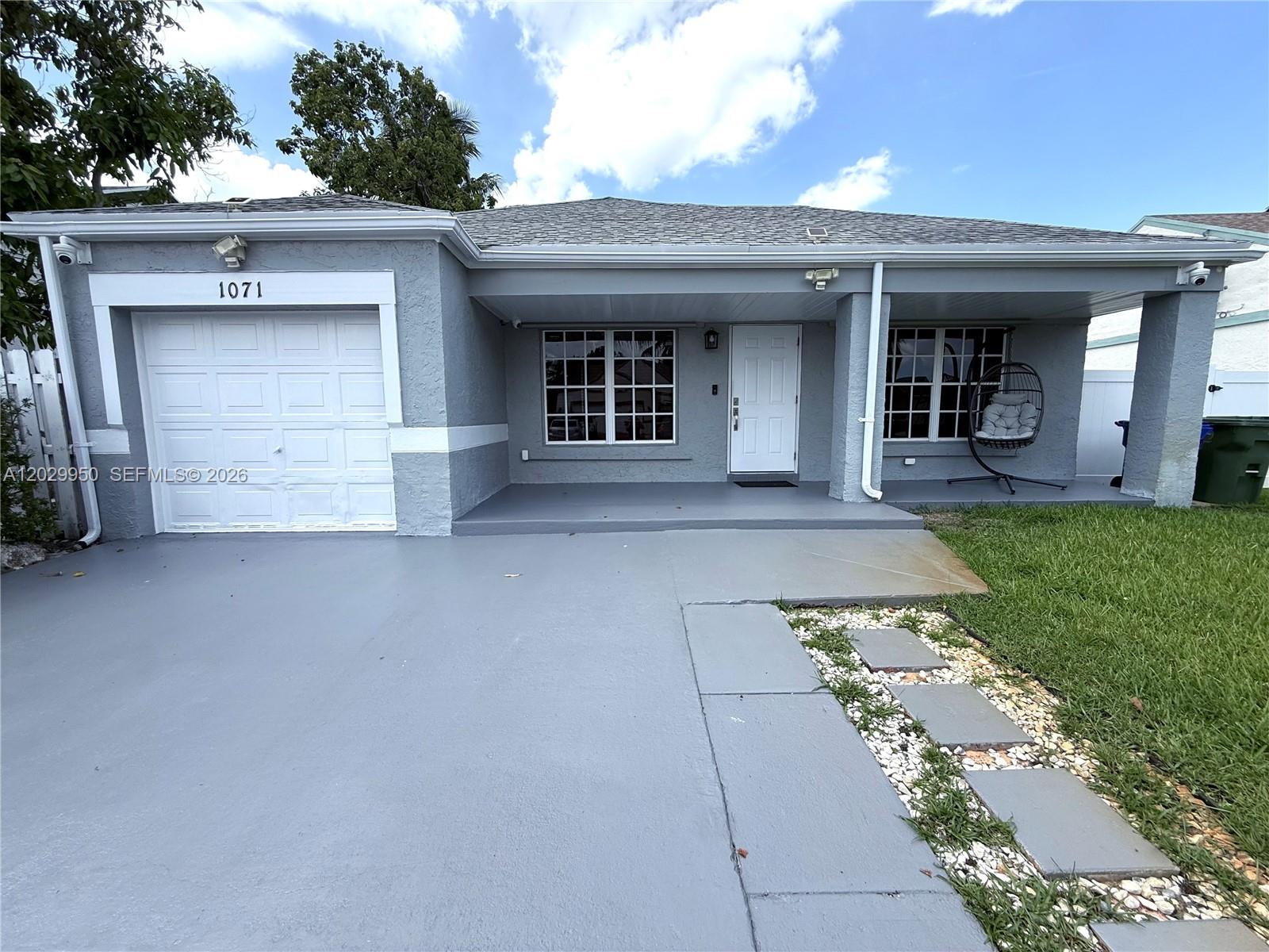 JUST LISTED IN PEMBROKE PINES! Beautifully updated 3 bedroom/2 bathroom home offering Comfort, style & flexibility! This move-in ready home features a bright open layout, renovated bathrooms, a modern kitchen with stainless steel appliances, porcelain flooring and LED lights throughout the entire house. Step outside to enjoy a spacious stamped-concrete patio and fully fenced backyard perfect for family gatherings.Updated exterior paint, hurricane protection, ample parking & very low HOA fees(which offer access to community pool, tennis court & park) Conveniently located near top-rated schools, shopping, dining and major highways with everything Pembroke Pines has to offer! Don't miss the opportunity to own this house, easy to show (just text me and I will confirm your appointment ) It won't last long!!!